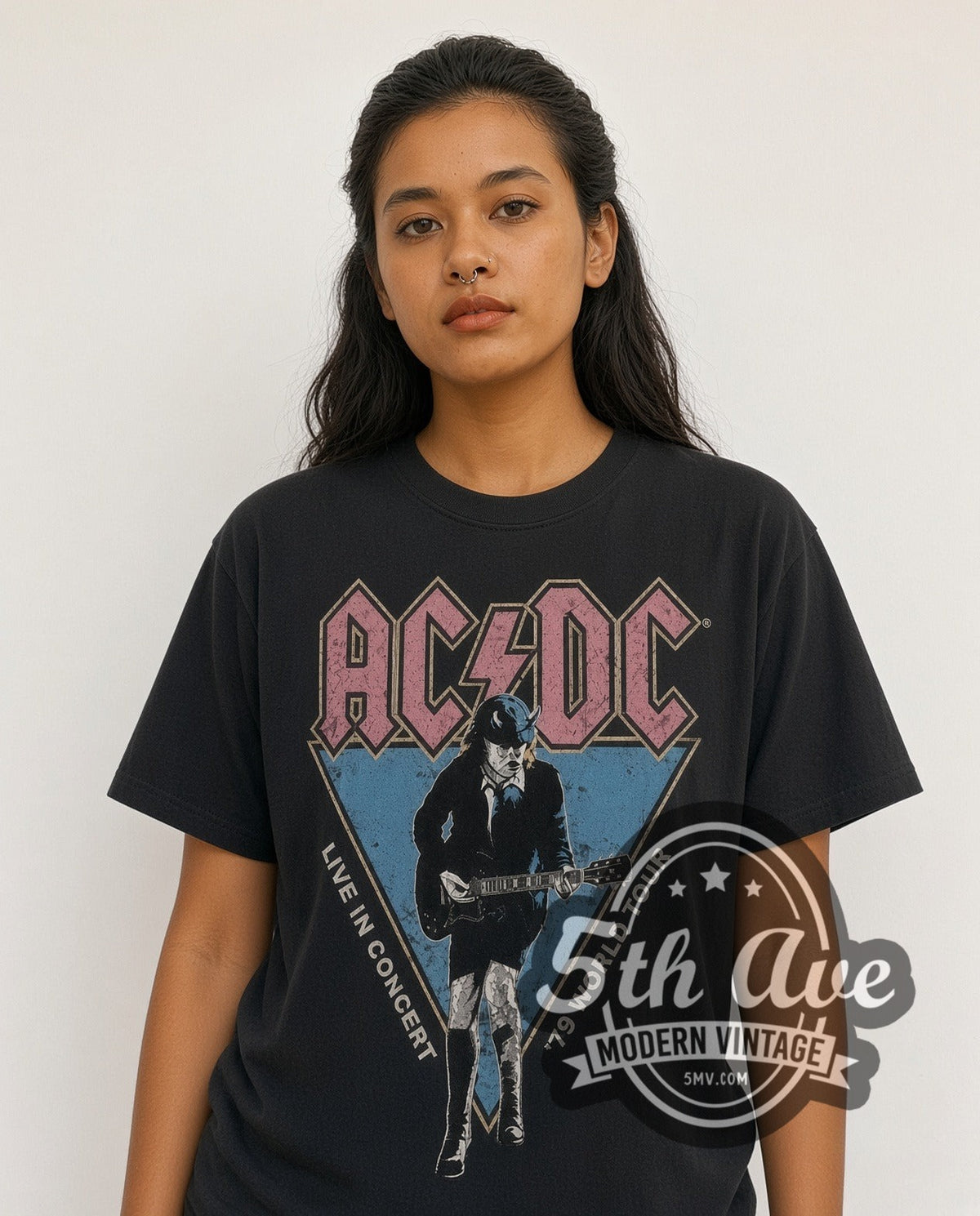 Model wearing the AC/DC Live in Concert '79 World Tour vintage band t-shirt in black