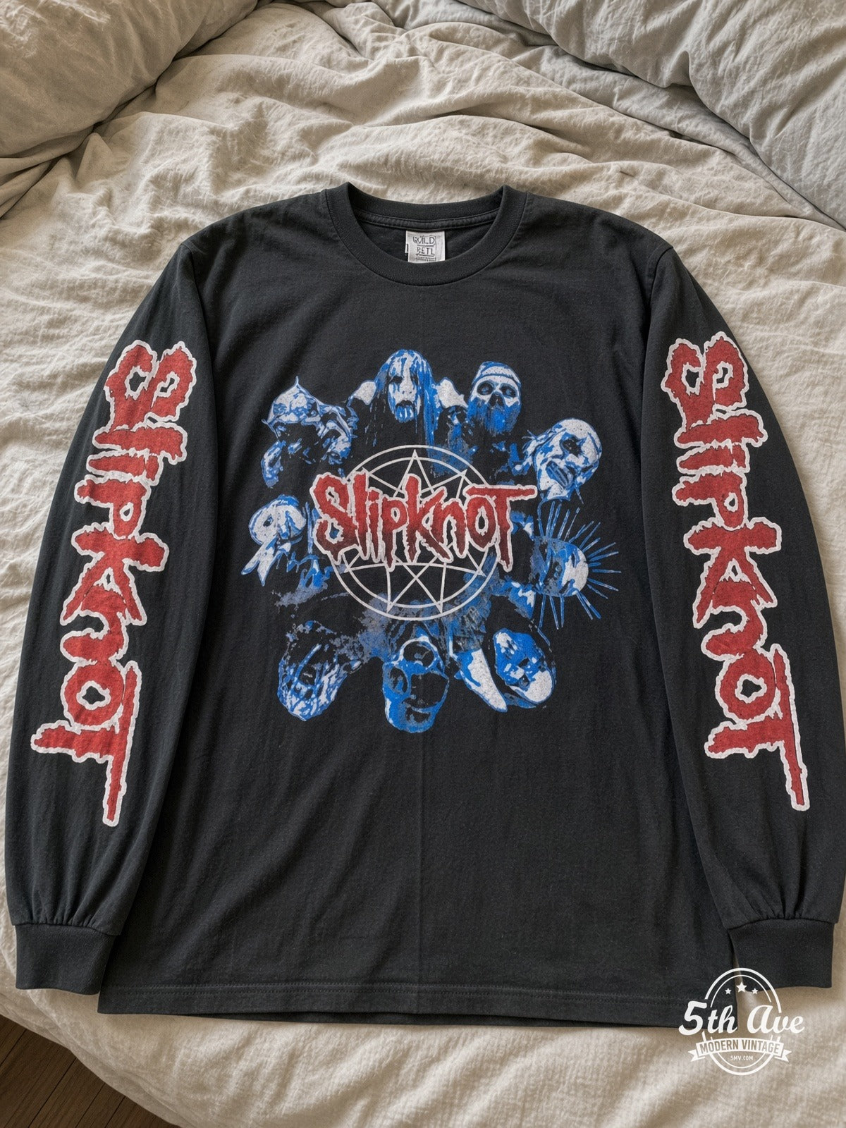ETS LS 48 Slipknot Masks Star Logo long sleeve vintage tee laid on a bed