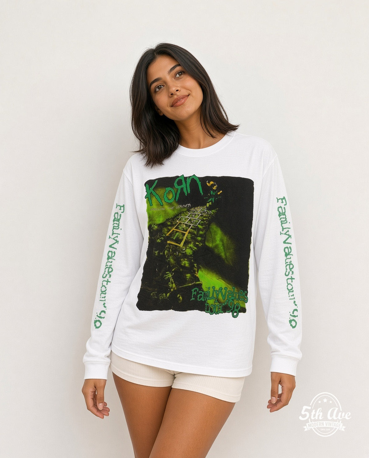 Model wearing the Korn Follow the Leader Family Values Tour 98 Long Sleeve vintage band t-shirt in white