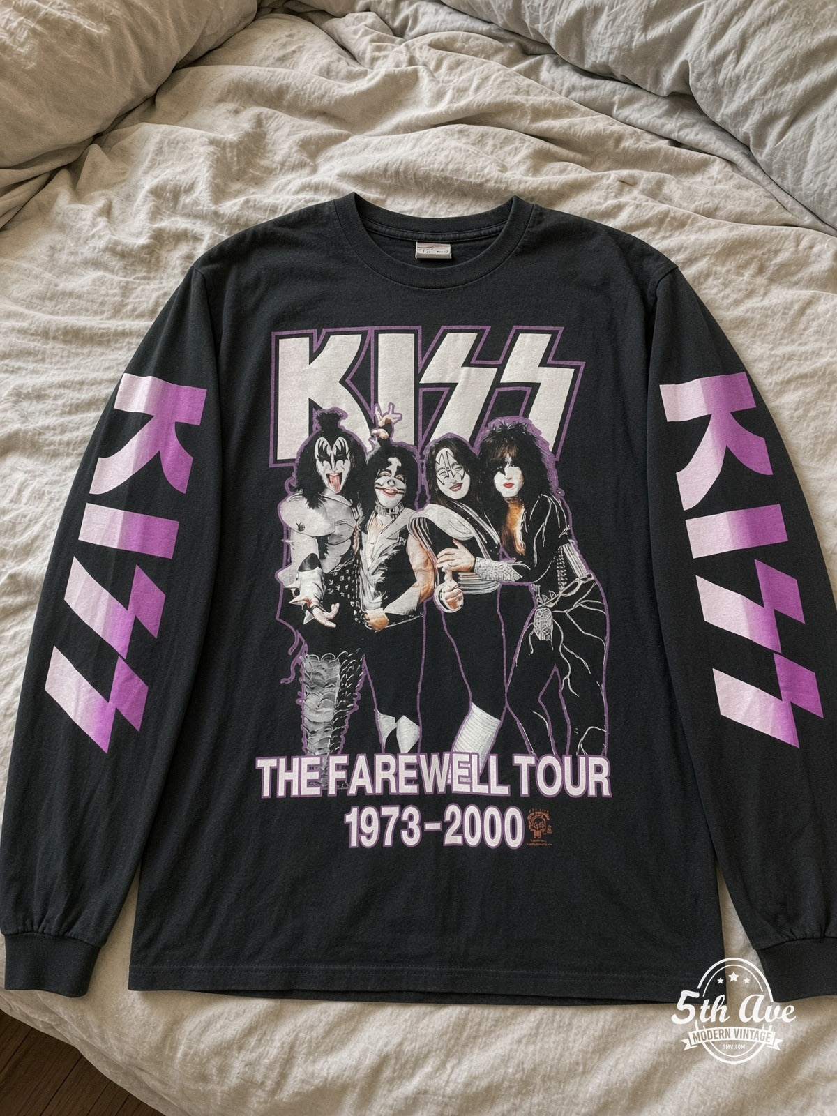 ETS LS 50 KISS Farewell Tour 1973-2000 long sleeve vintage tee laid on a bed