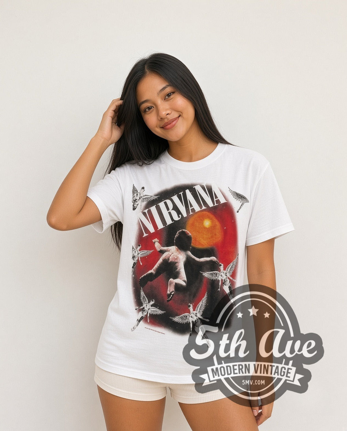 Model wearing the Nirvana Orange Moon vintage band t-shirt in white