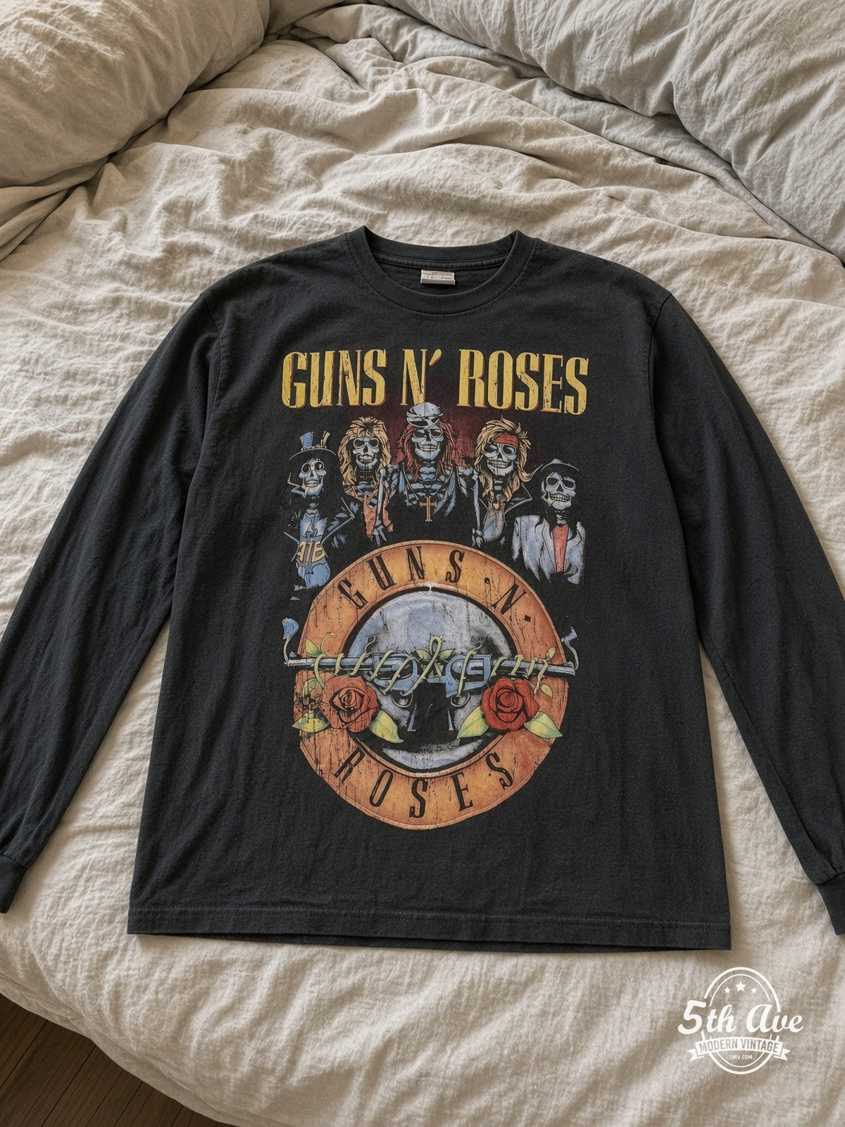 ETS LS 51 Guns N' Roses Skulls Bullet Logo long sleeve vintage tee laid on a bed