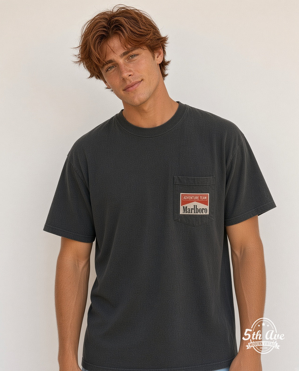 Model wearing the Marlboro Adventure Team graphic tee in black