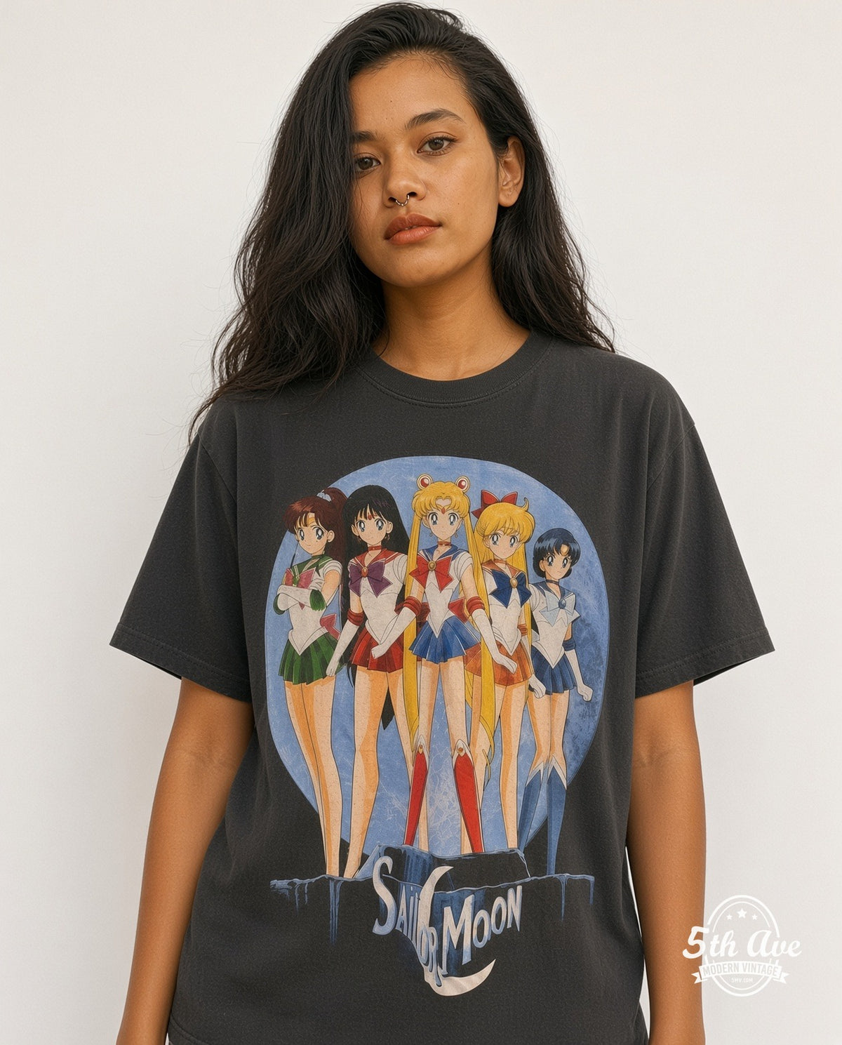 Model wearing the Sailor Moon Five Guardians on the Moon anime tee in black
