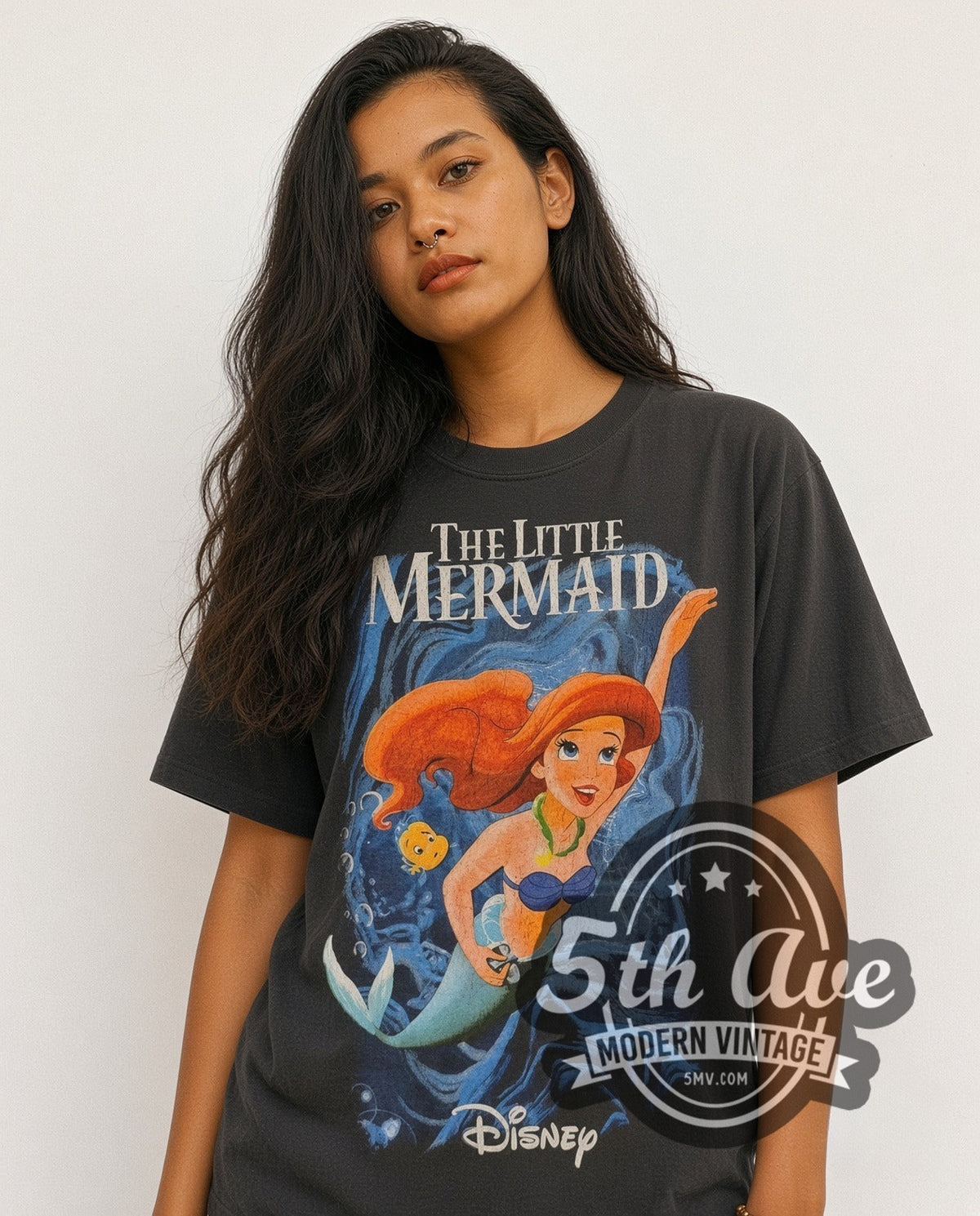 Model wearing the Disney The Little Mermaid Ariel and Flounder vintage cartoon tee in black