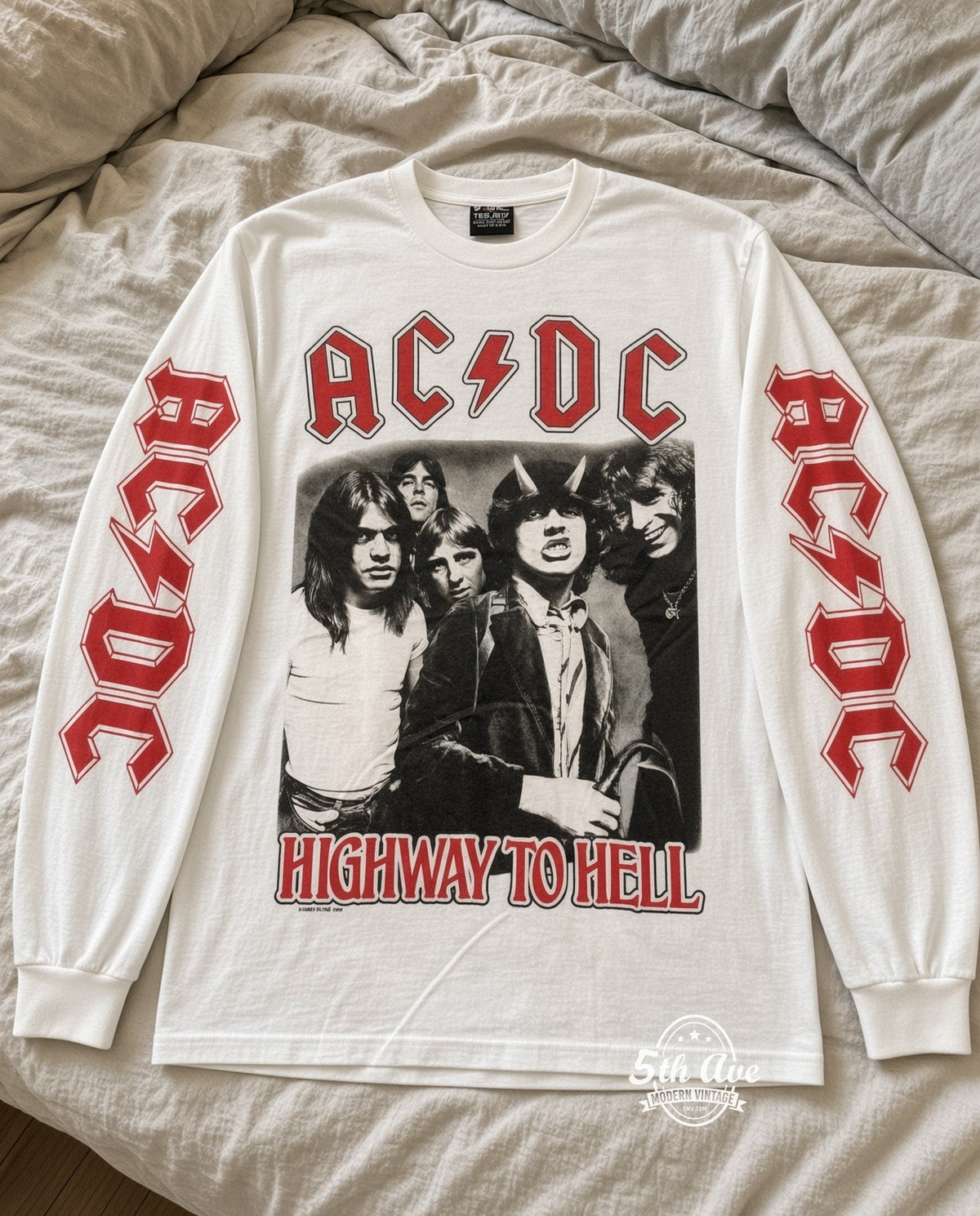 ETS LS 63 AC/DC Highway to Hell long sleeve vintage tee laid on a bed