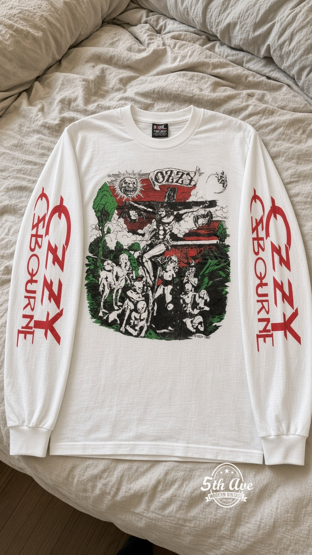 ETS LS 65 Ozzy Osbourne Crucifixion Cartoon long sleeve vintage tee laid on a bed