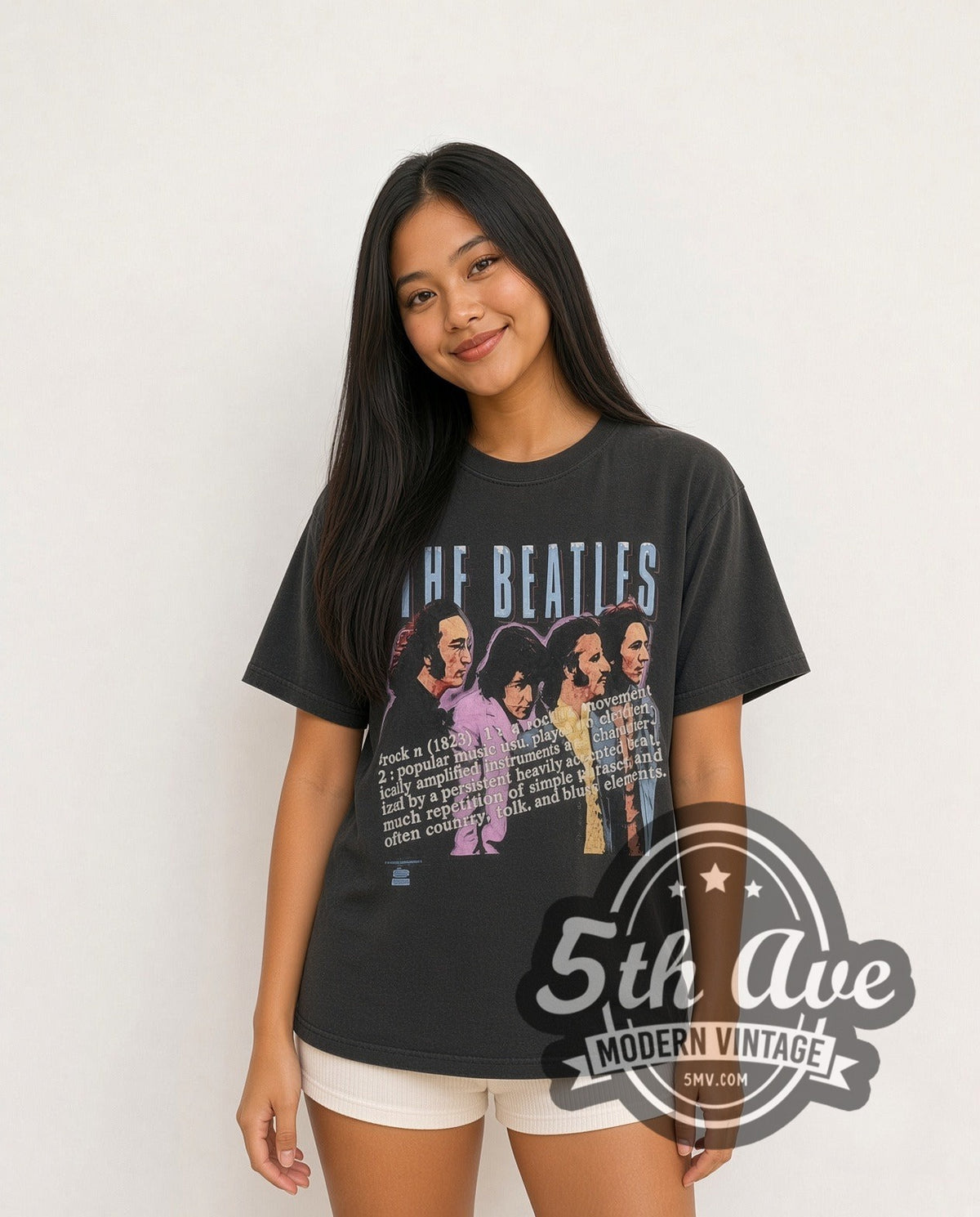 Model wearing The Beatles Definition of Rock vintage band t-shirt in black