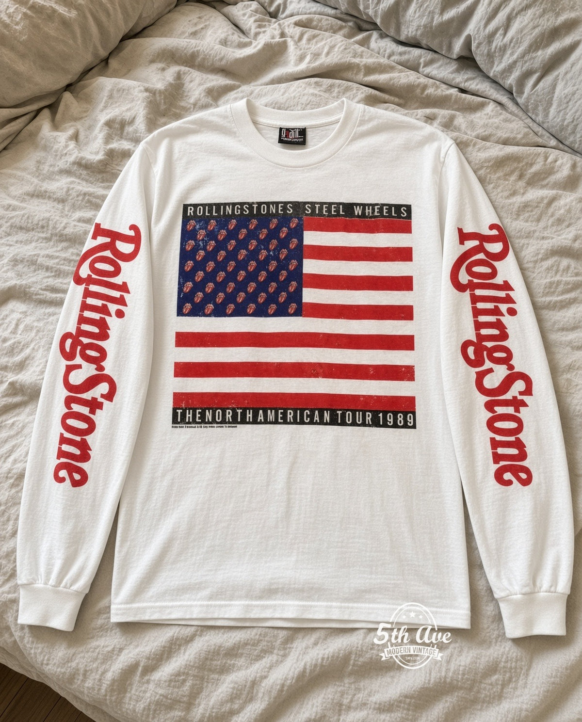 ETS LS 78 The Rolling Stones Steel Wheels Flag long sleeve vintage tee laid on a bed