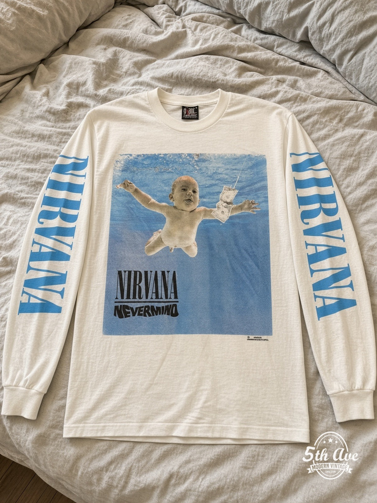 ETS LS 79 Nirvana Nevermind long sleeve vintage tee laid on a bed