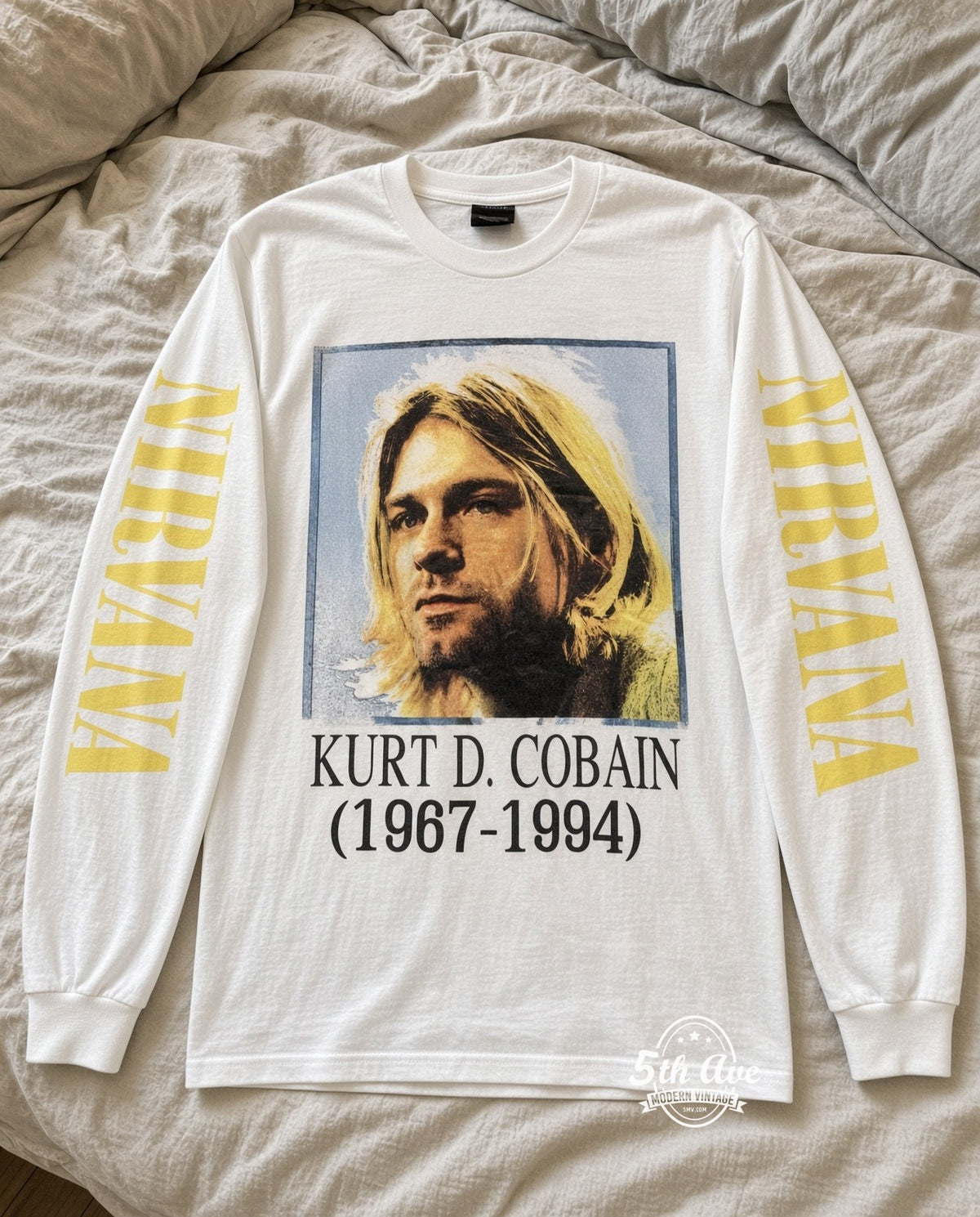 ETS LS 87 Nirvana Kurt Cobain Portrait long sleeve vintage tee laid on a bed