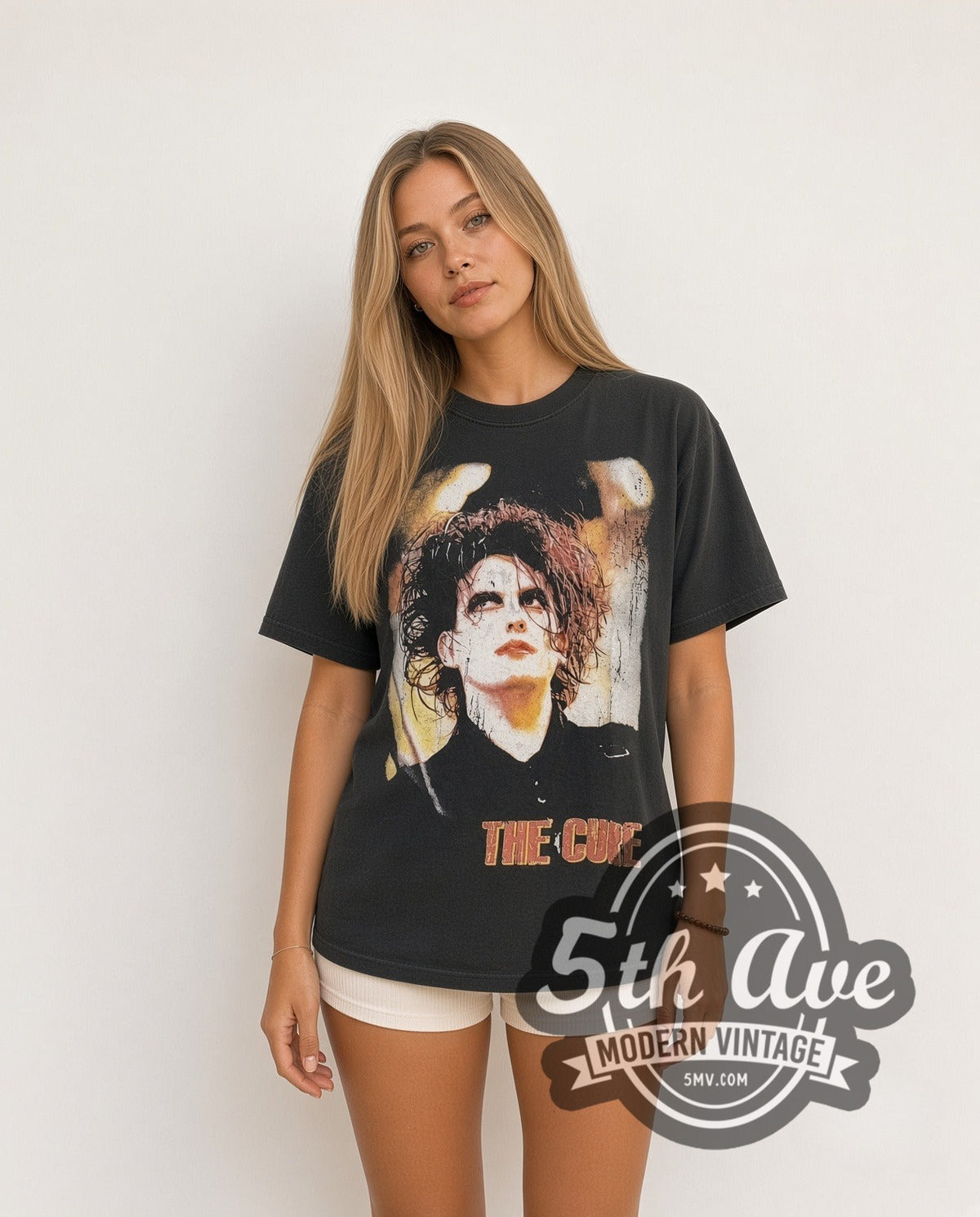 Model wearing The Cure Greatest Hits vintage band t-shirt in black