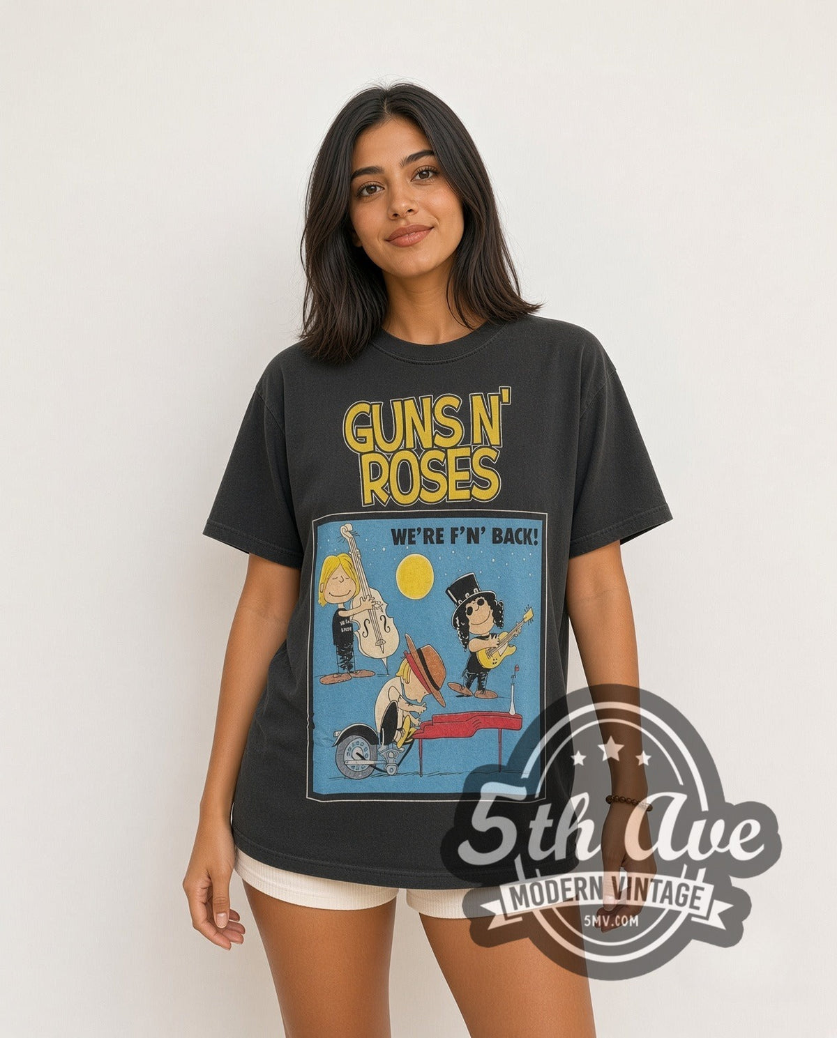 Model wearing the Peanuts Guns N' Roses x Snoopy WE'RE F'N BACK! vintage cartoon tee in black