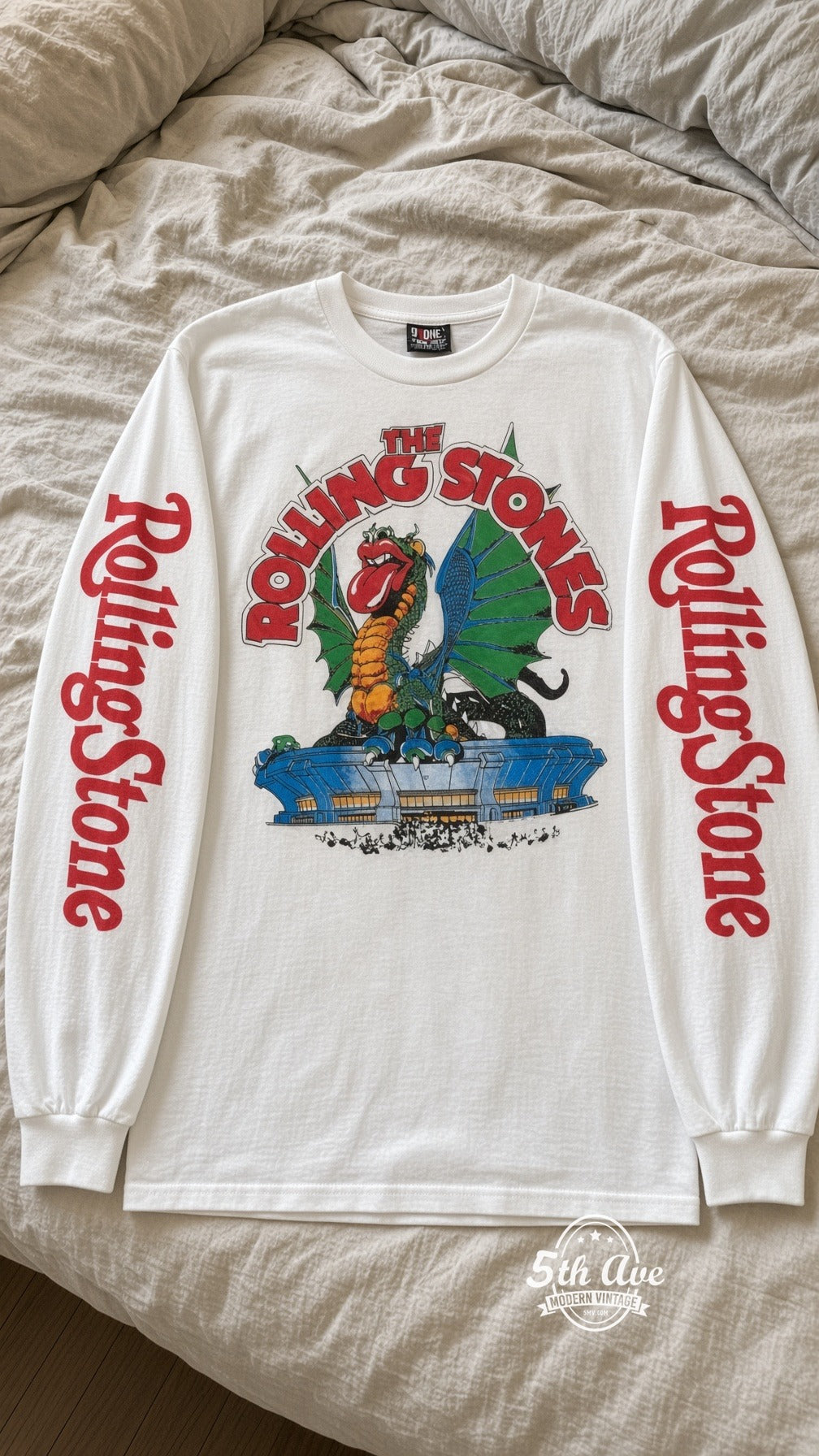 ETS LS 90 The Rolling Stones Dragon long sleeve vintage tee laid on a bed