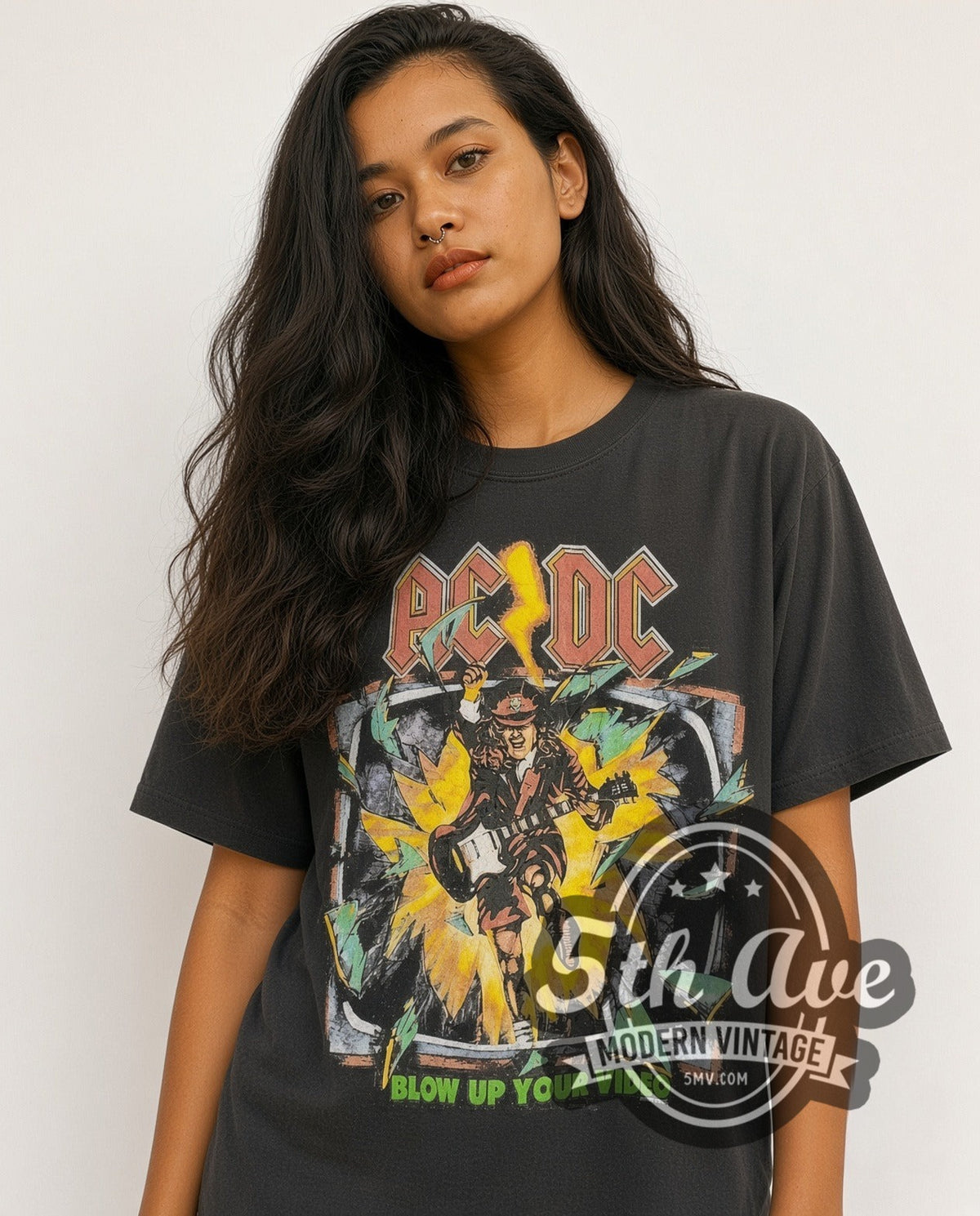 Model wearing the AC/DC Blow Up Your Video TV Burst City List vintage band t-shirt in black