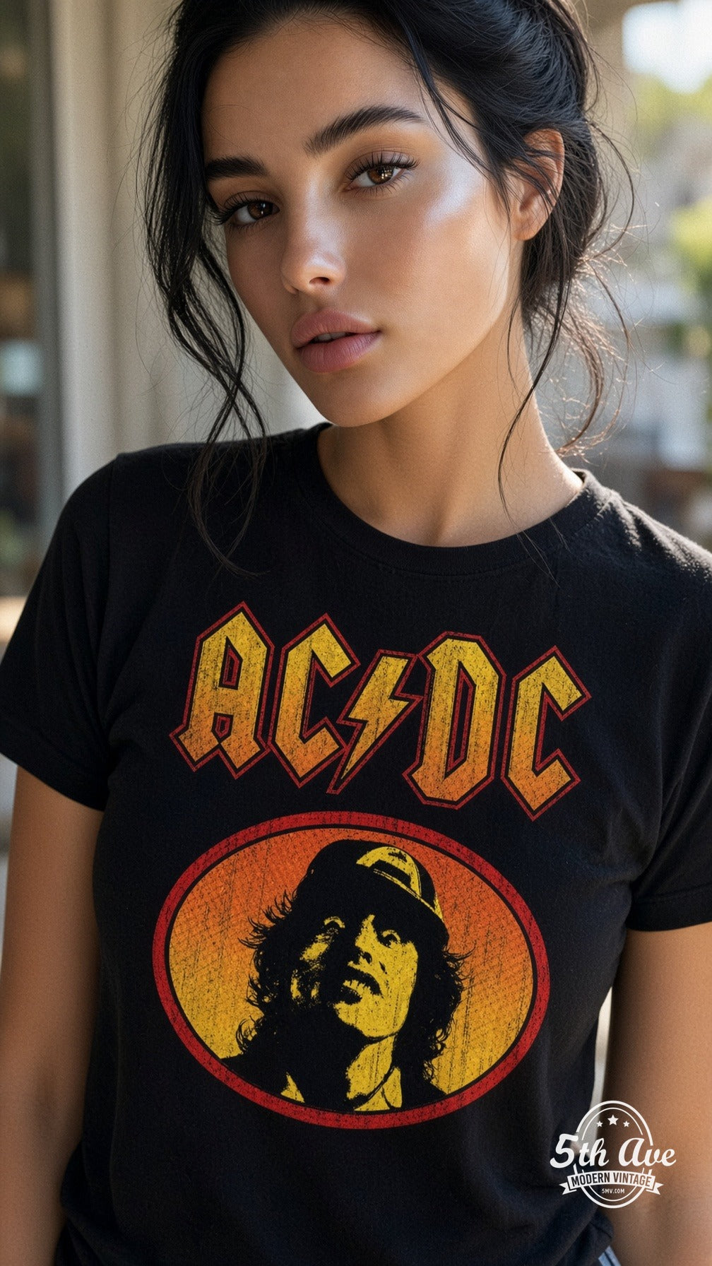 Model wearing AC/DC Angus Young oval vintage band tee