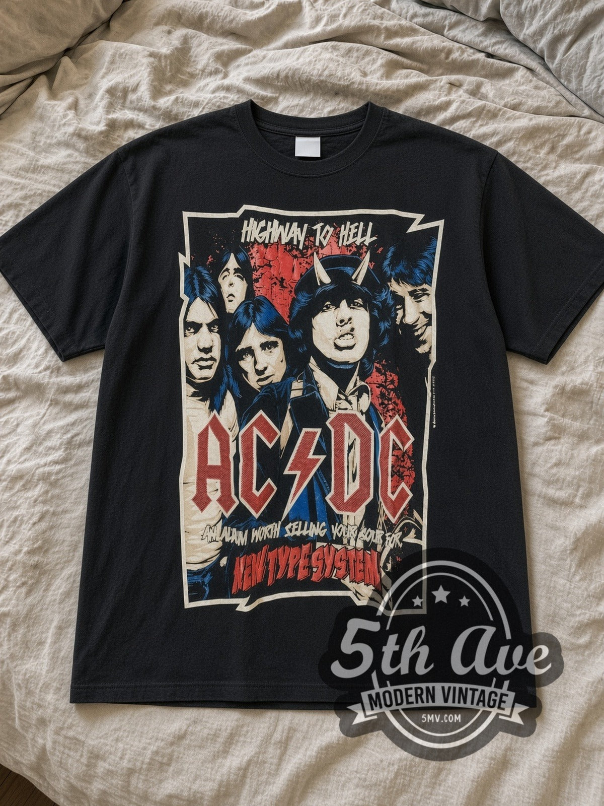 Black AC/DC Highway to Hell New Type System Devil Horns Vintage Band T-Shirt laid flat on a linen bed