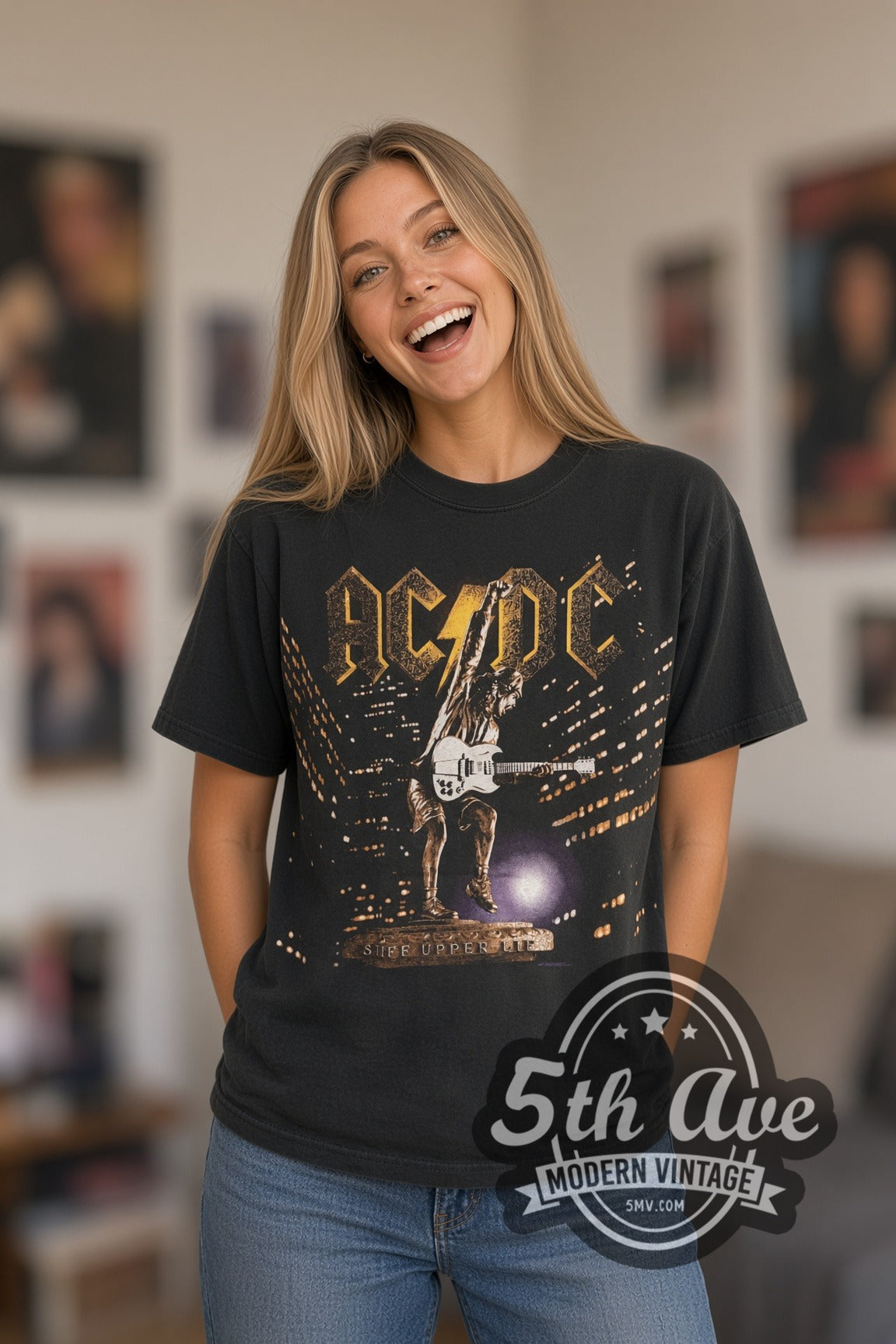Woman wearing black AC/DC Stiff Upper Lip Angus Statue Tour vintage band t-shirt