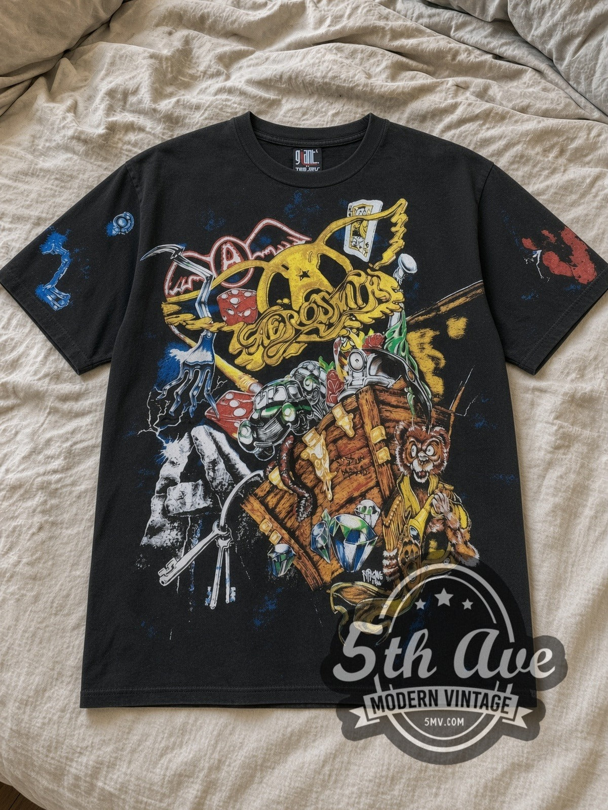 Black Aerosmith Rockin' Journey All Over Print Vintage Band T-Shirt laid flat on a linen bed
