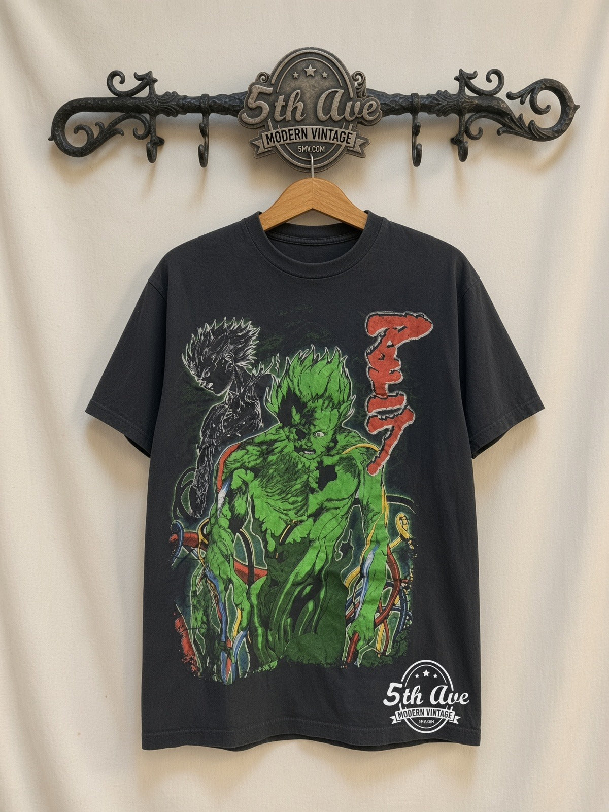 Akira Green Mutated Tetsuo Mech Arm vintage anime t-shirt on rack