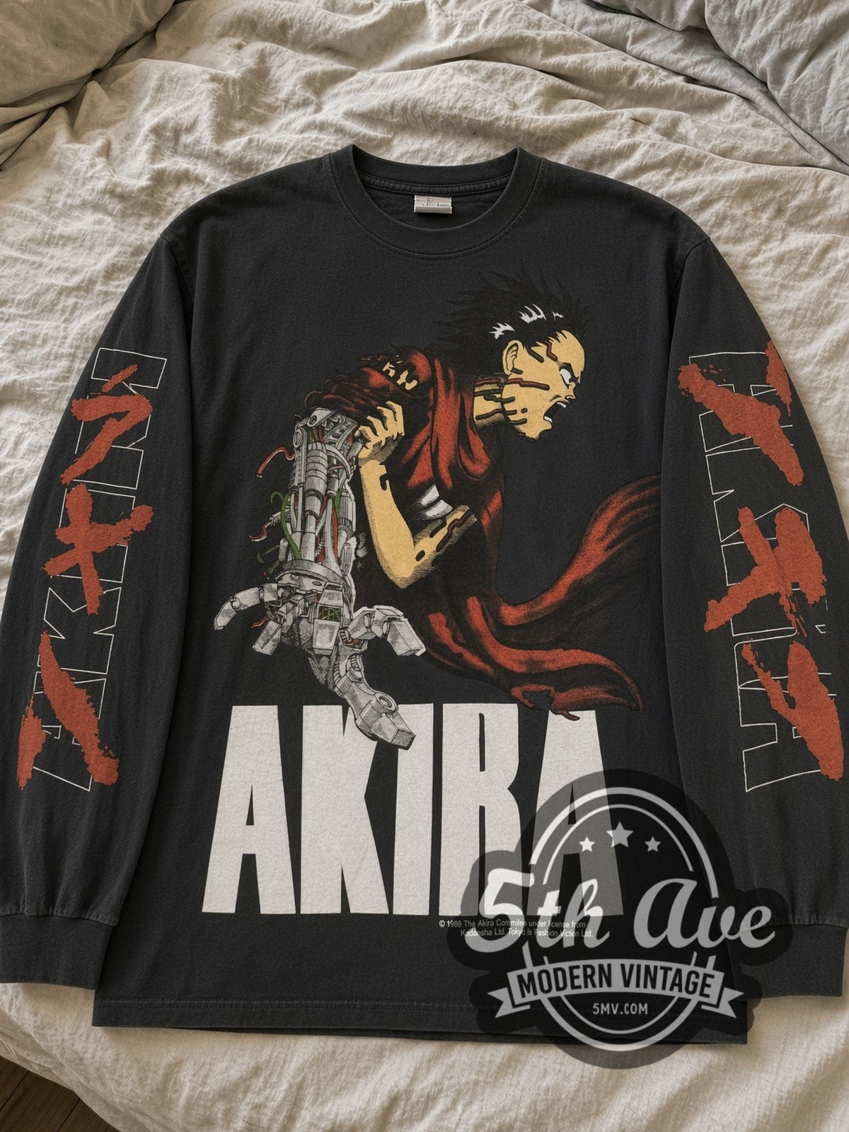 Black Akira Tetsuo Robot Arm & Katakana Back long sleeve tee laid flat on linen bed