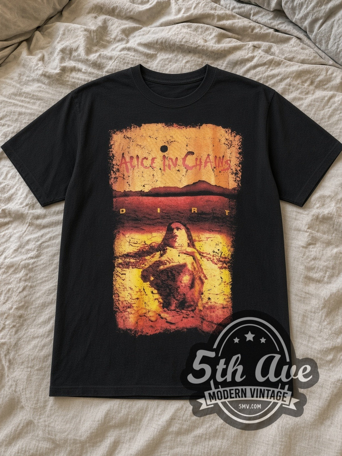 Black Alice in Chains Dirt Vintage Band T-Shirt laid flat on a linen bed