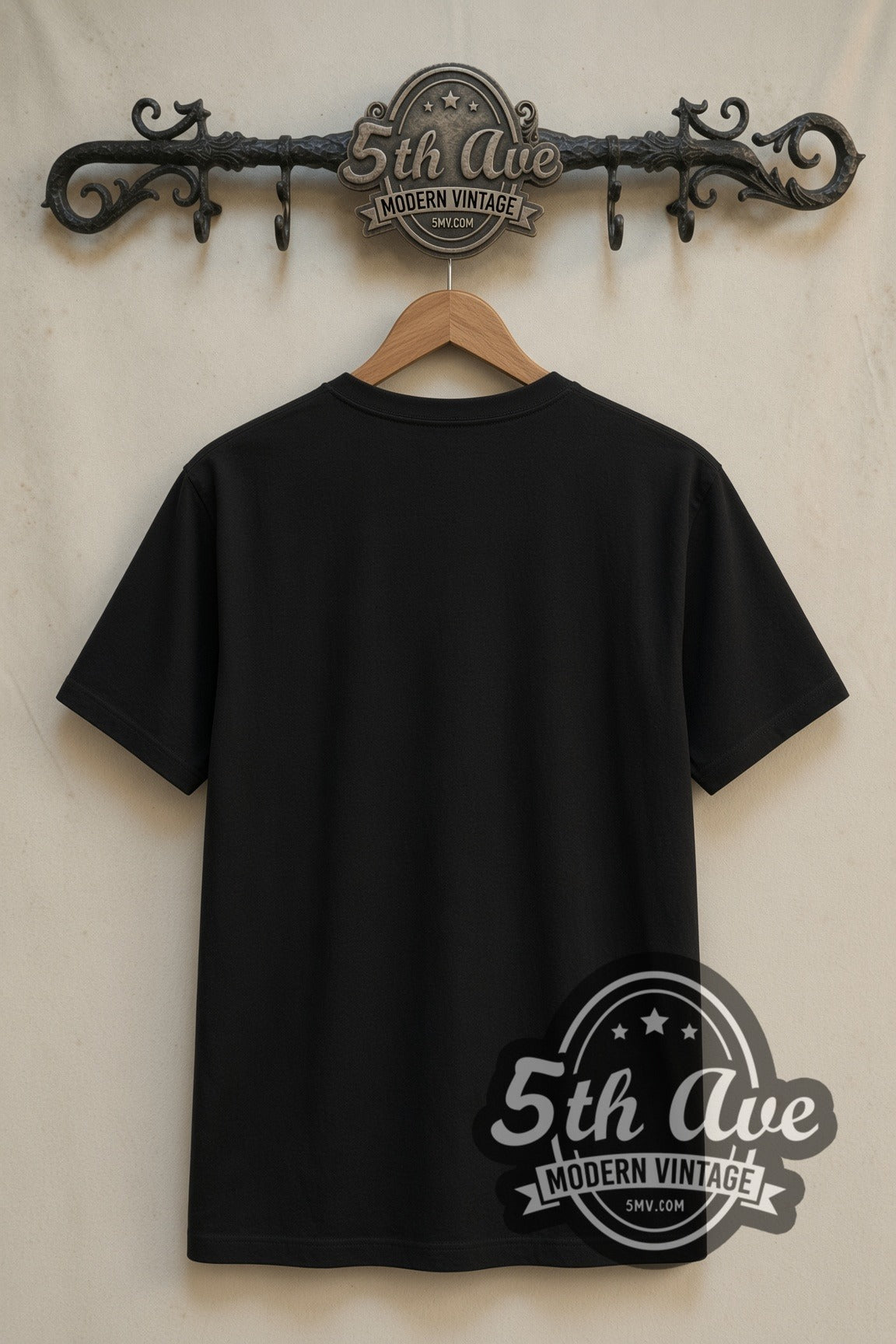 Plain black back of Ant-Man Quantumania double stitched tee on rack