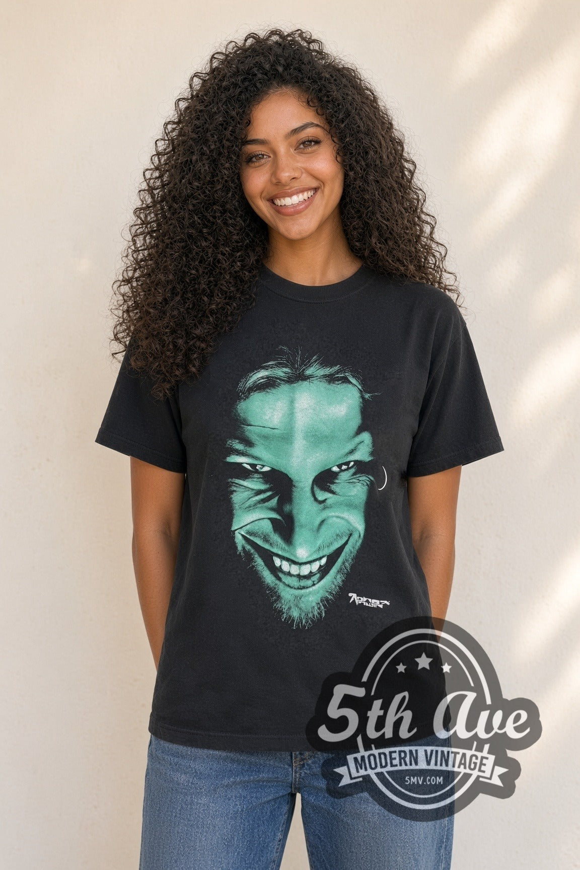 Woman wearing black Aphex Twin Richard D. James Grin & Logo vintage band t-shirt
