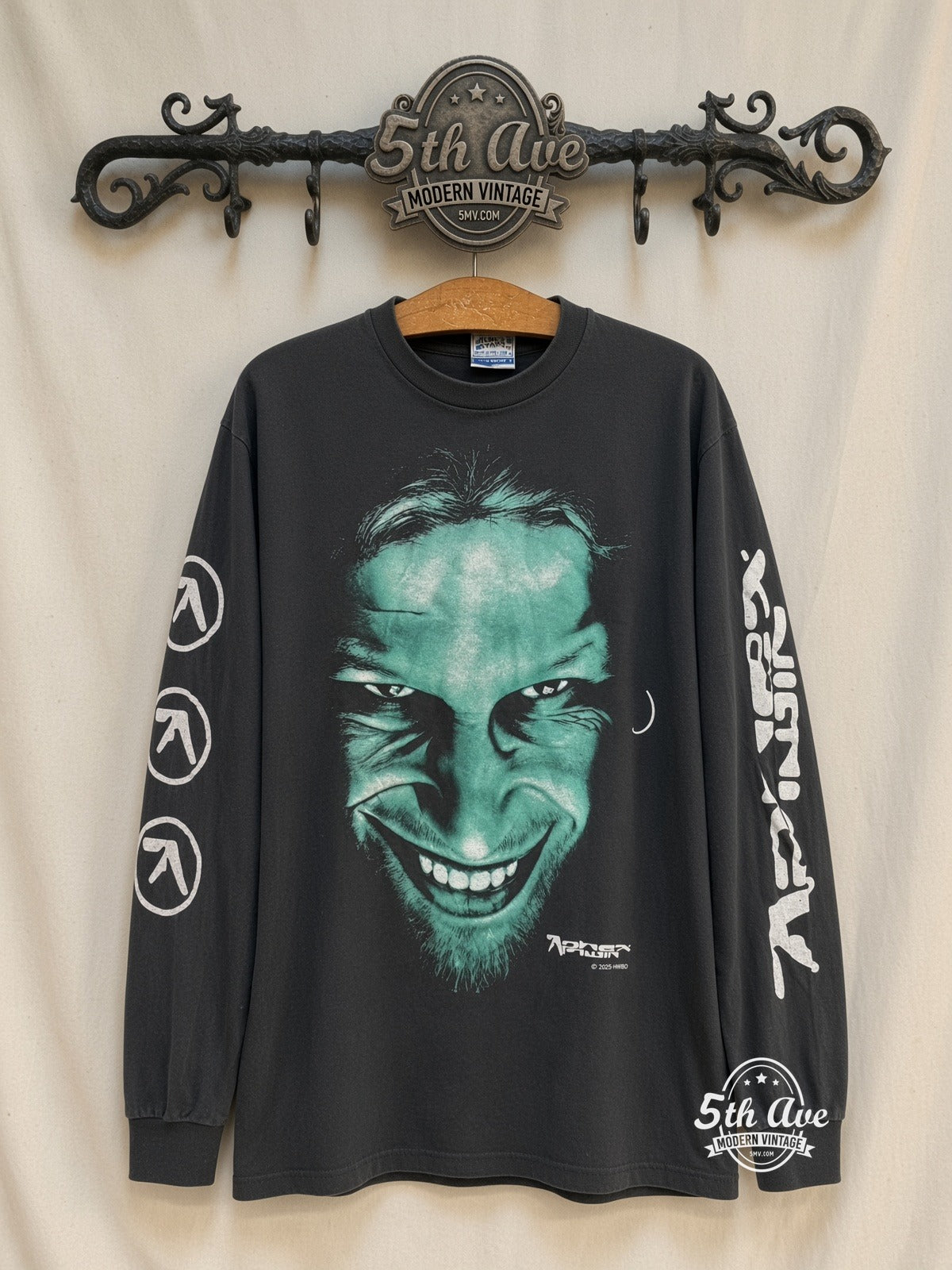 Aphex Twin Richard D. James Grin vintage band t-shirt on rack
