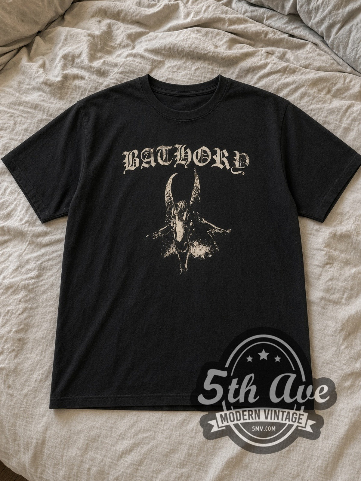 Black Bathory Goat Logo Pentagram Back Vintage Band T-Shirt laid flat on a linen bed
