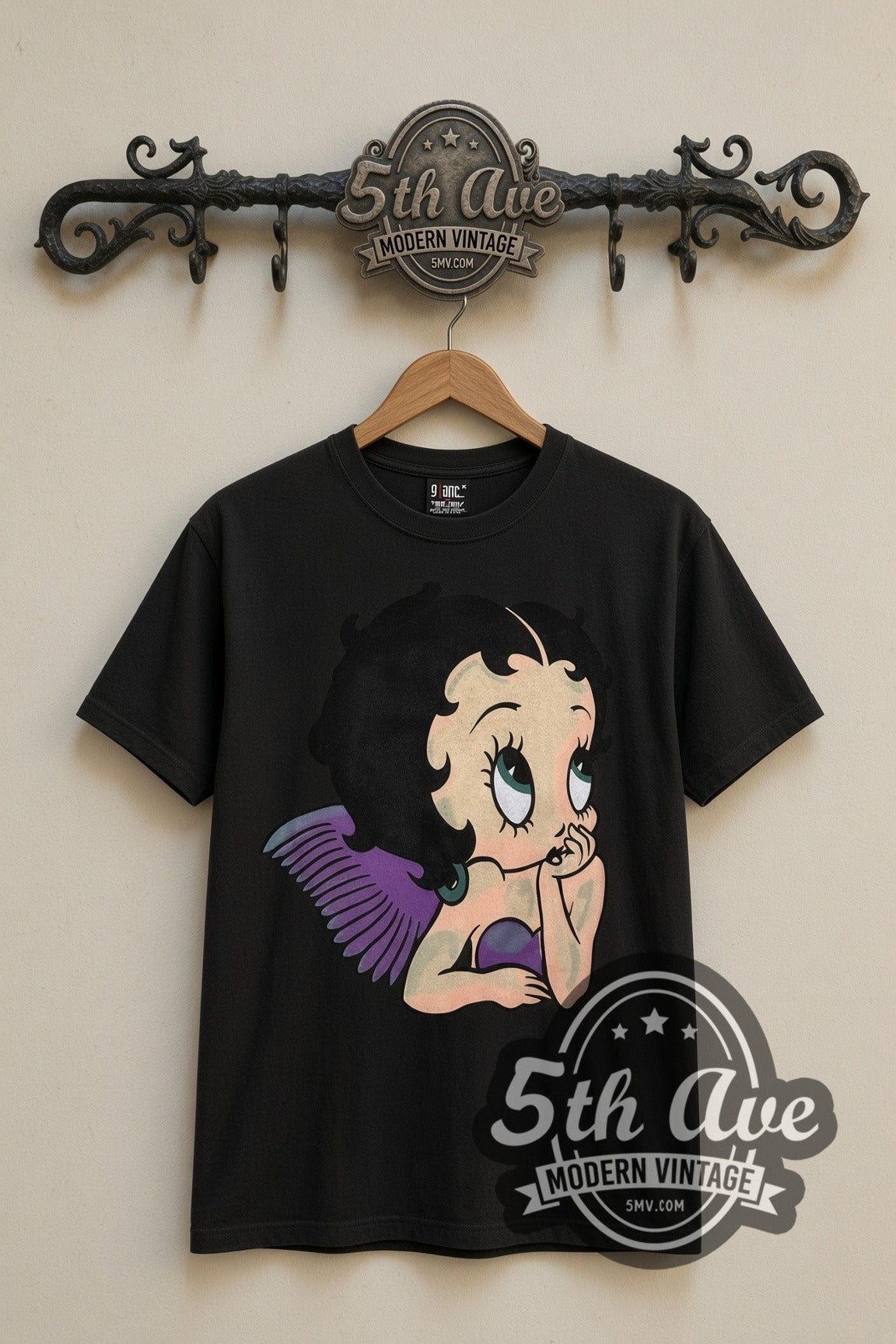 Betty Boop Angel Wings cartoon tee in black, front view on a display rack