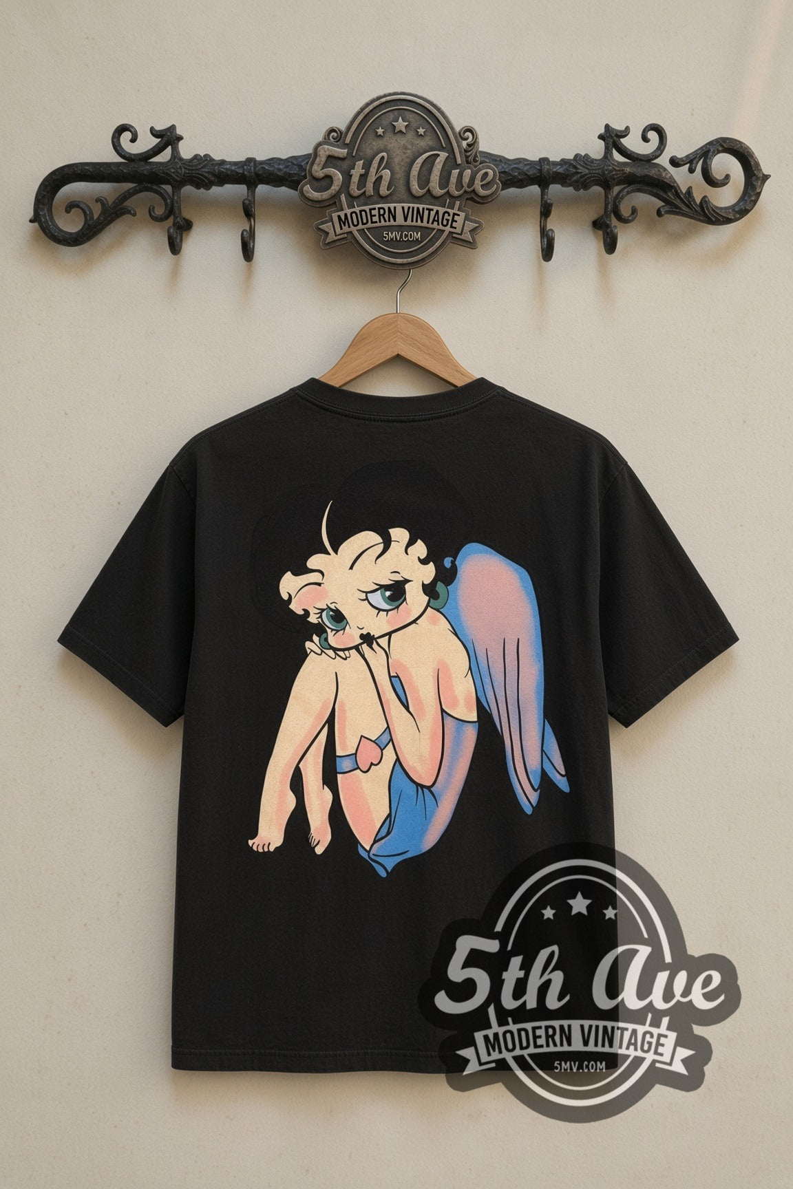 Betty Boop Angel Wings cartoon tee in black, back view on a display rack