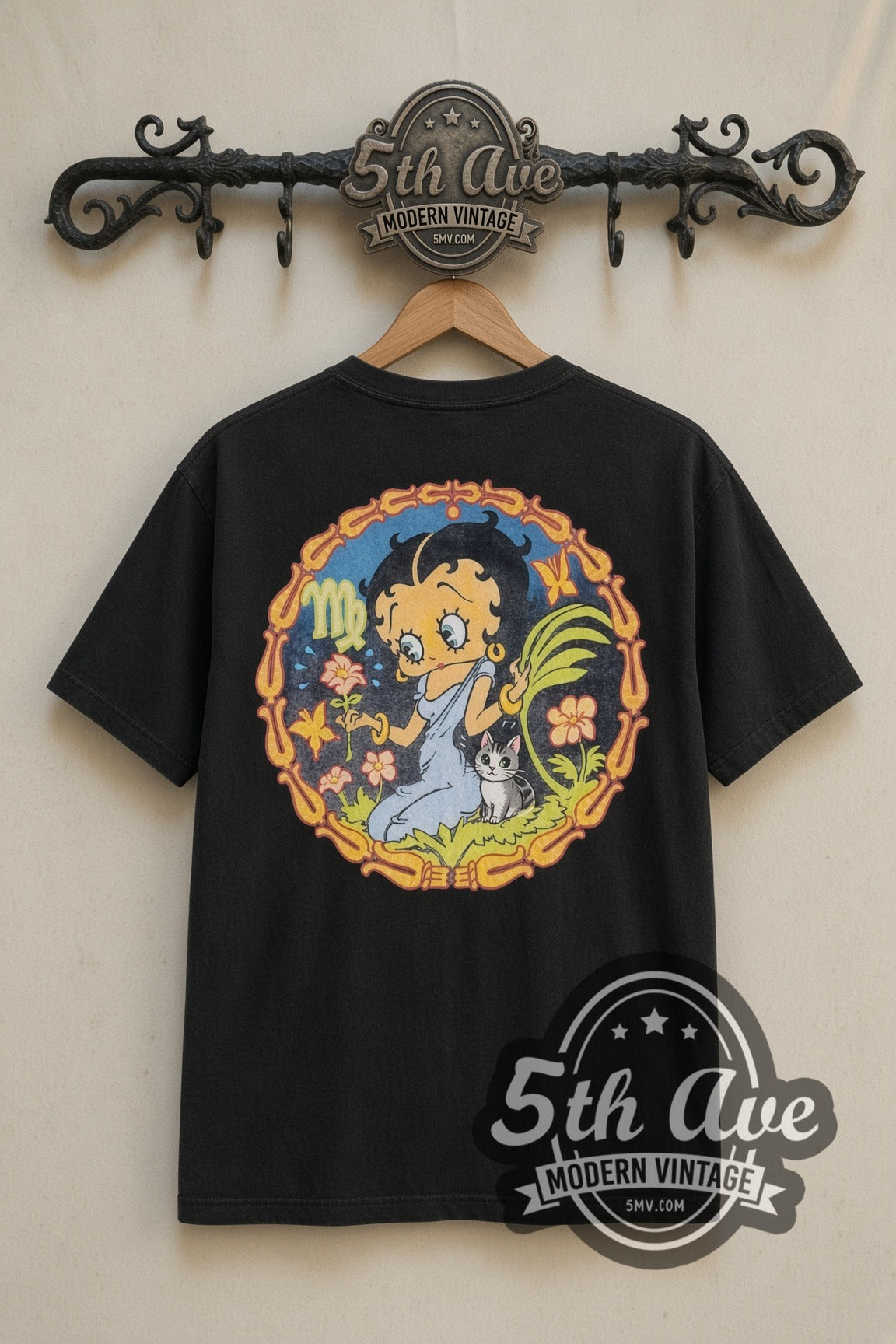 Betty Boop Beach Crab Floral Circle cartoon tee in black, back view on a display rack
