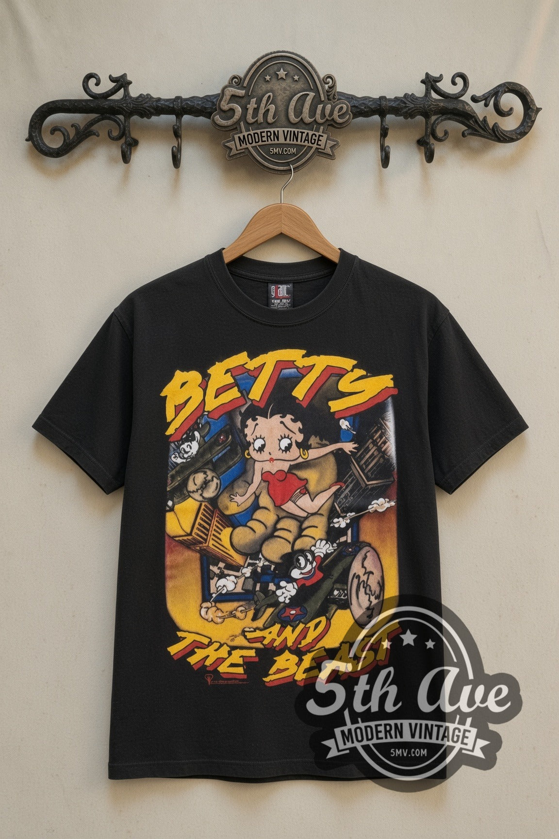 Betty Boop Betty and the Beast cartoon tee in black, front view on a display rack