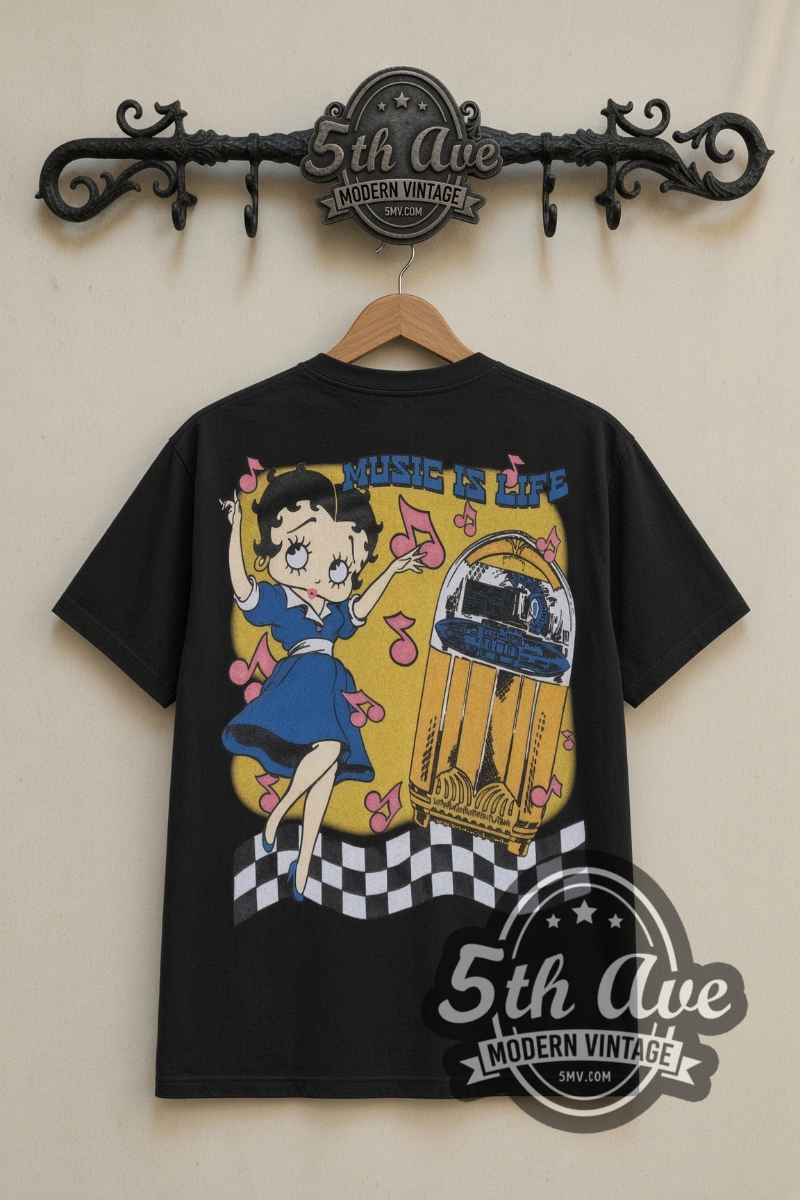 Betty Boop Boop Oop A Doop Music is Life cartoon tee in black, back view on a display rack