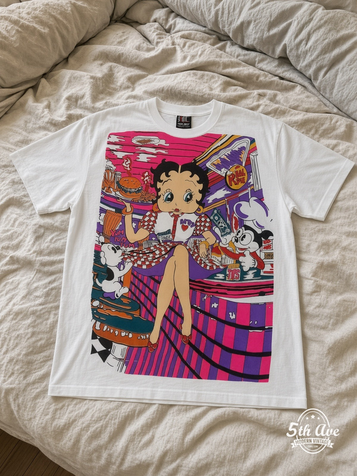 Betty Boop Betty Boop Checkered Dress Abstract vintage tee laid on bed
