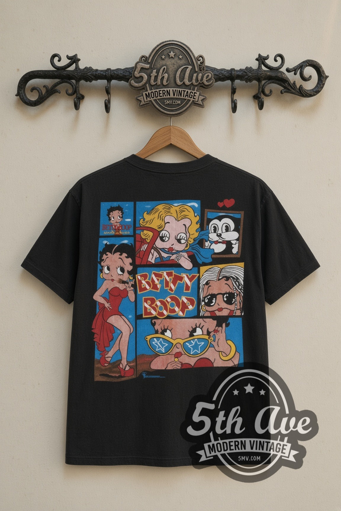 Betty Boop Comic Collage cartoon tee in black, back view on a display rack