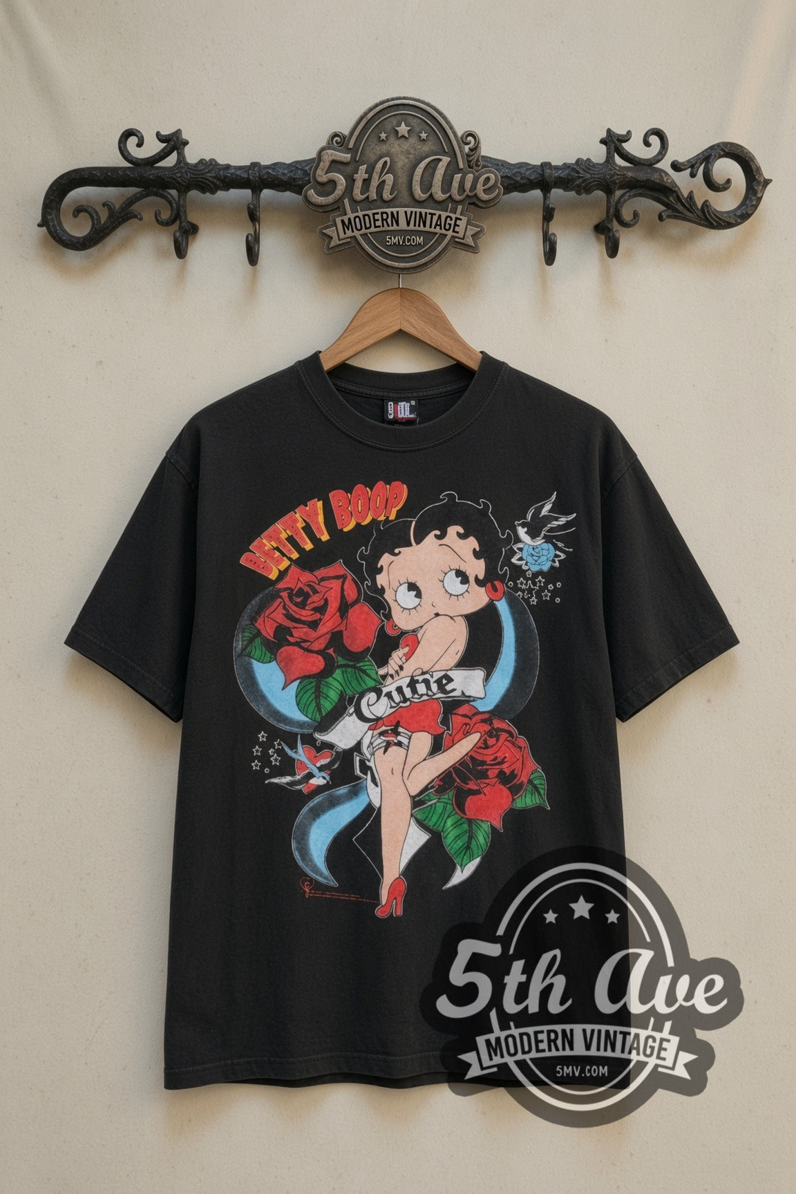 Betty Boop Cutie Tattoo Roses cartoon tee in black, front view on a display rack
