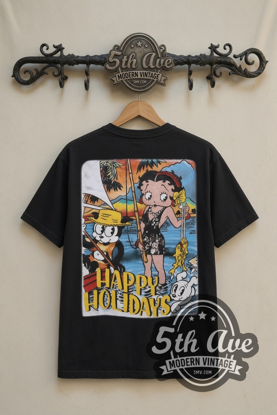 Betty Boop Happy Holidays cartoon tee in black, back view on a display rack