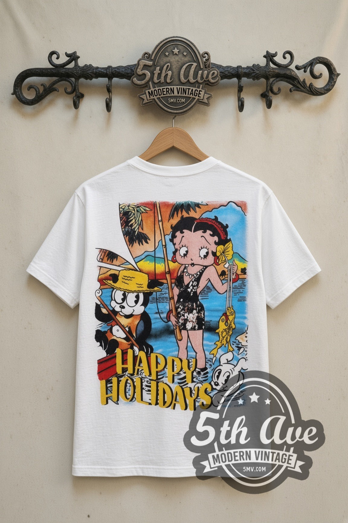 Betty Boop Happy Holidays cartoon tee in white, back view on a display rack