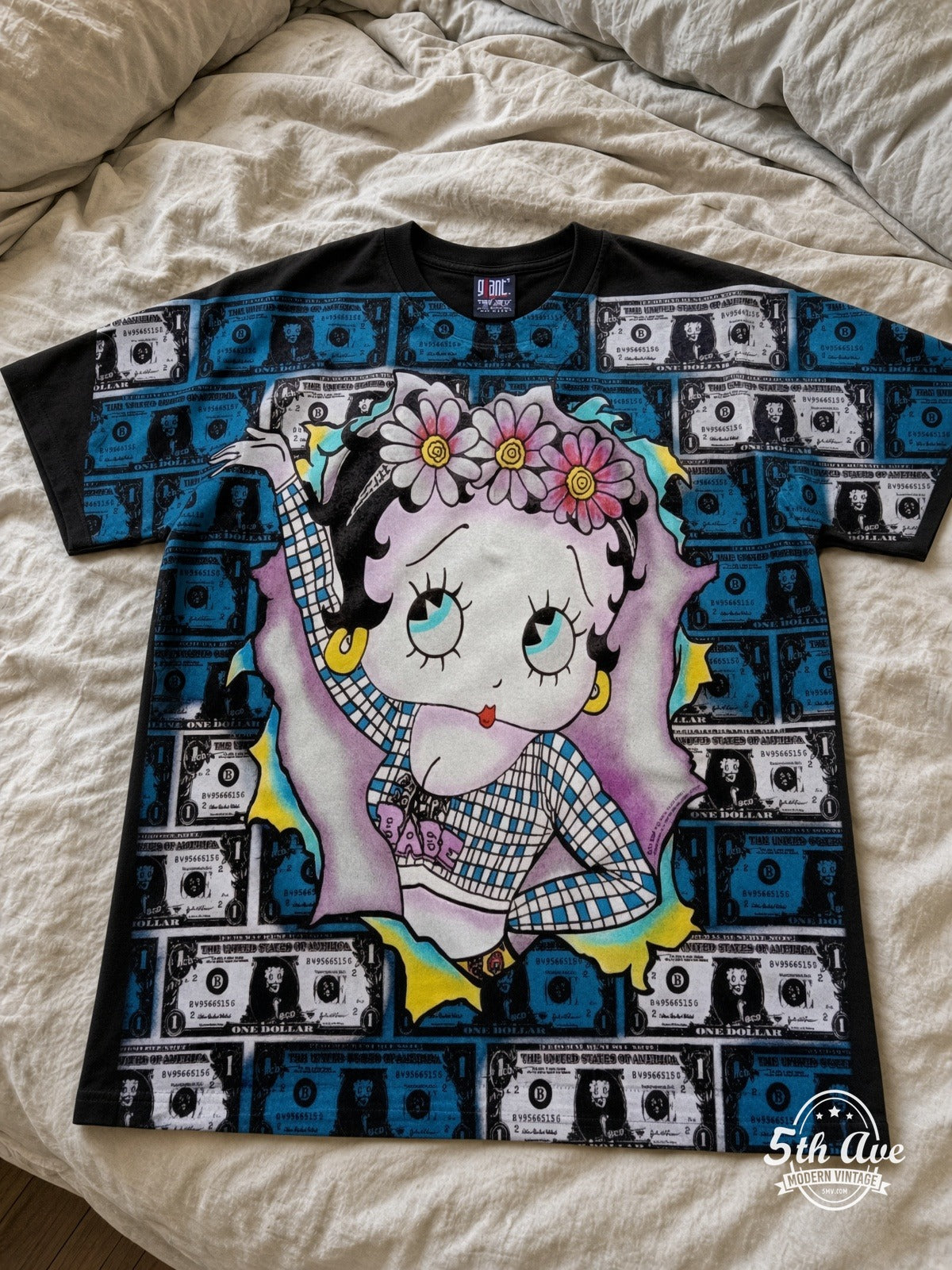 Betty Boop Betty Boop Hundred Dollar Bills vintage tee laid on bed