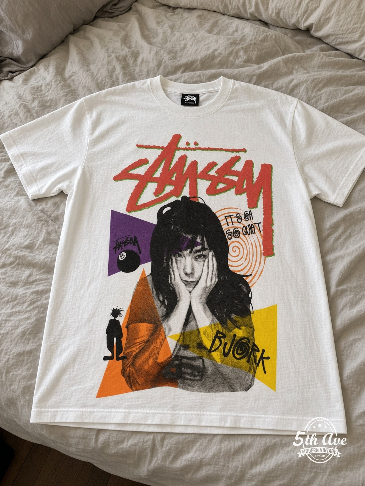 Björk It's Oh So Quiet vintage tee laid on bed
