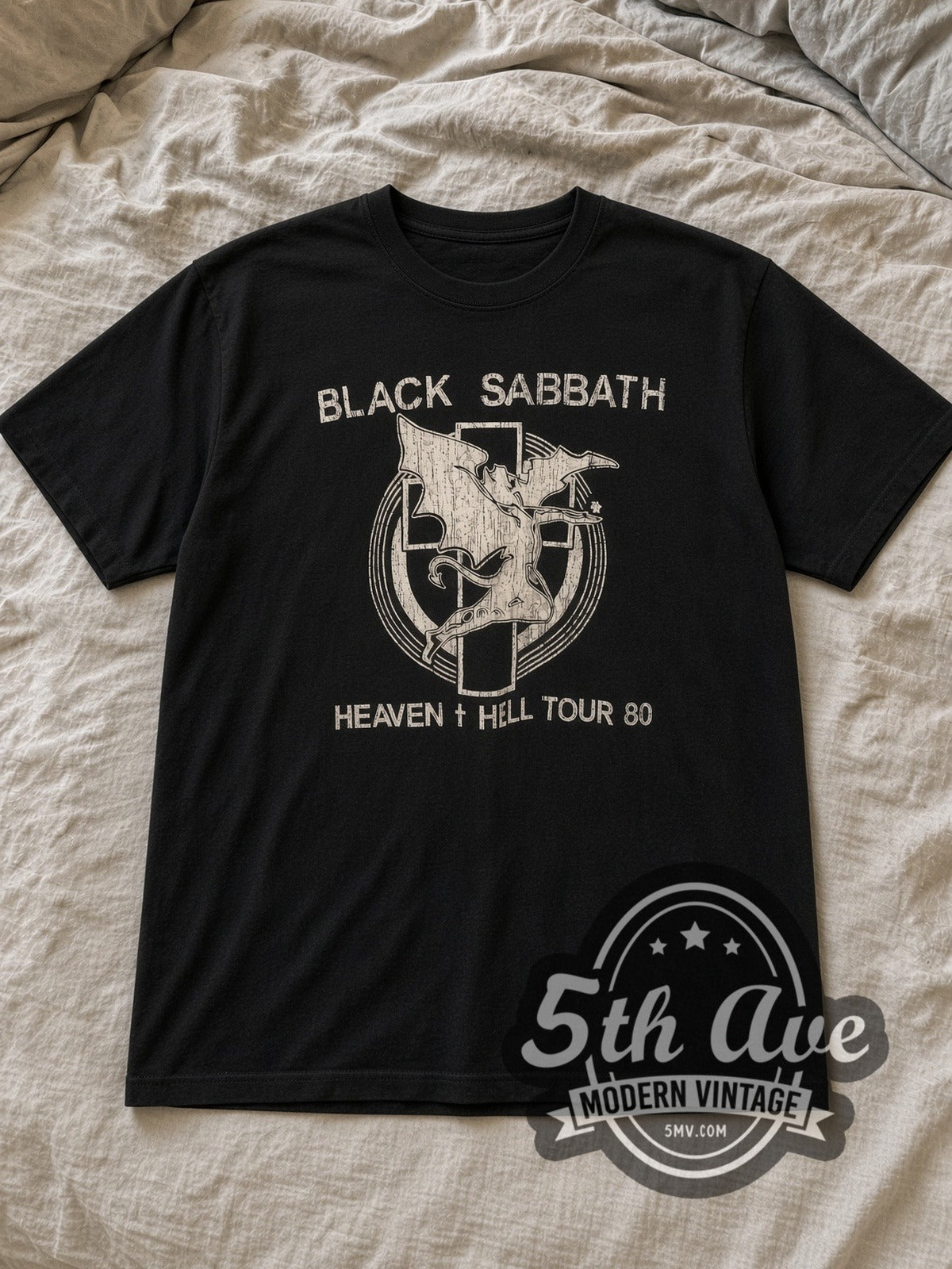 Black Black Sabbath Heaven and Hell Tour 1980 Vintage Band T-Shirt laid flat on a linen bed