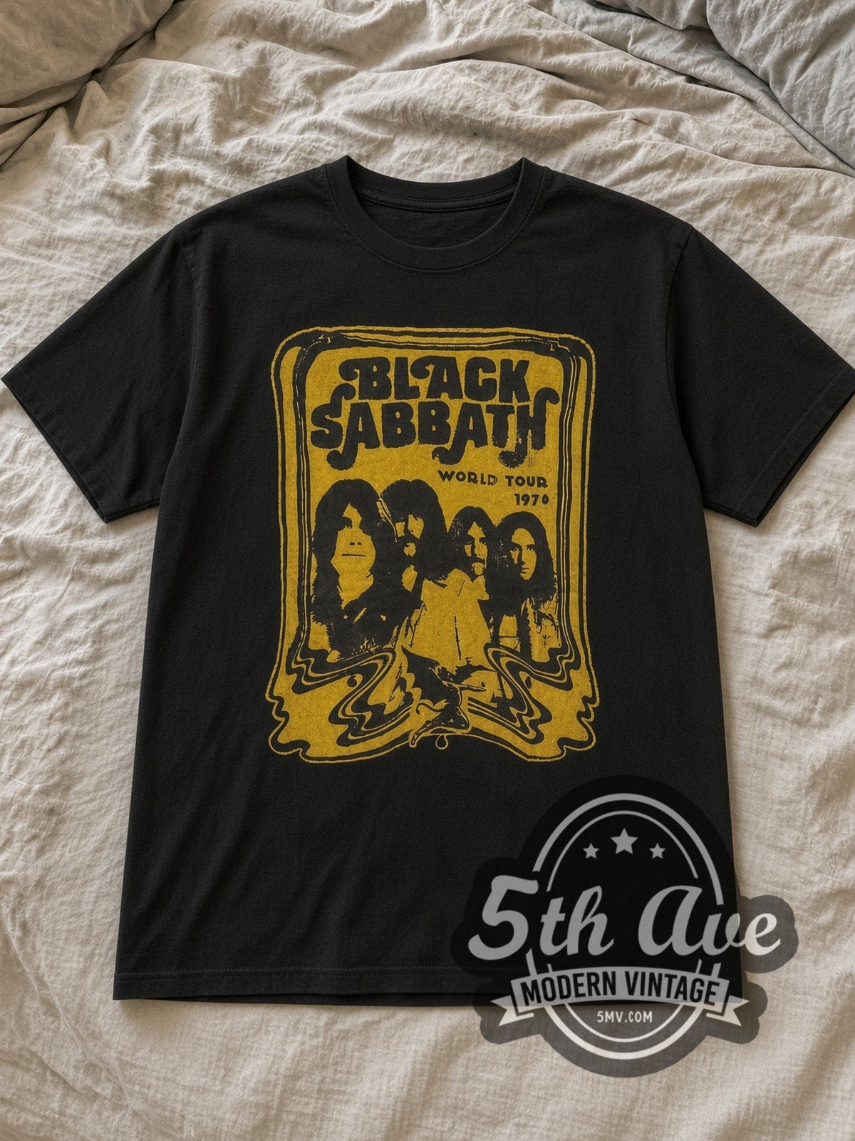 Black Black Sabbath World Tour 1978 Yellow Group Portrait Vintage Band T-Shirt laid flat on a linen bed