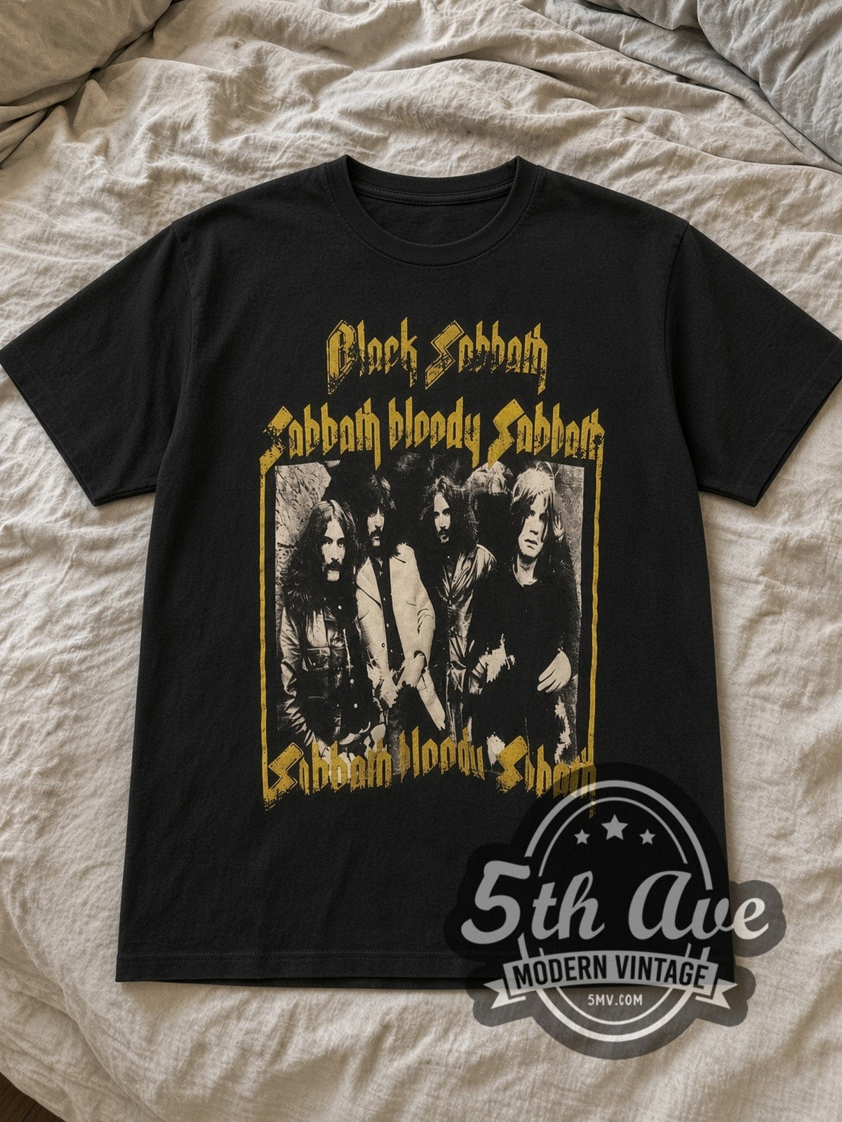 Black Sabbath Sabbath Bloody Sabbath Vintage Band T-Shirt in black, laid flat on a linen bed