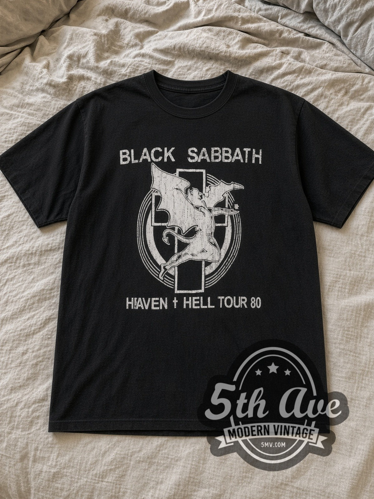 Black Sabbath Heaven & Hell Resonance Vintage Band T-Shirt in black, laid flat on a linen bed