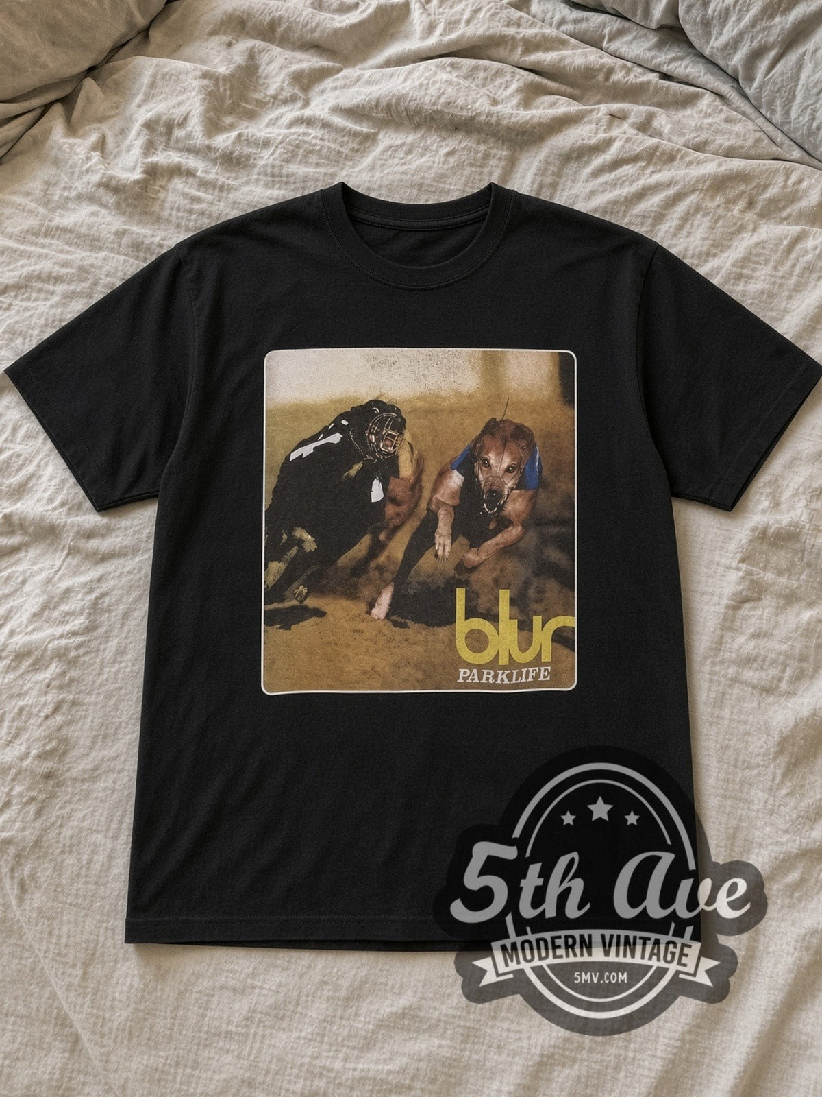 Black Blur Parklife Vintage Band T-Shirt laid flat on a linen bed