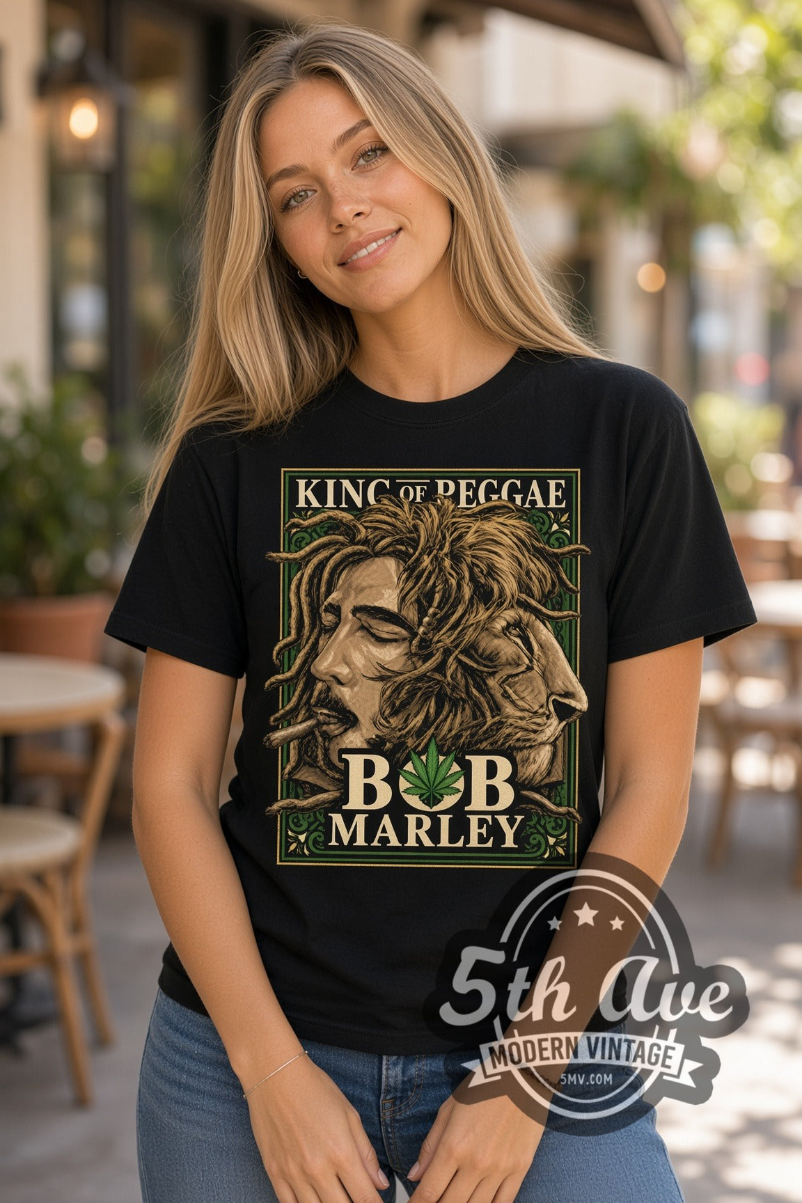 Woman wearing Bob Marley King of Reggae lion double stitched black graphic tee