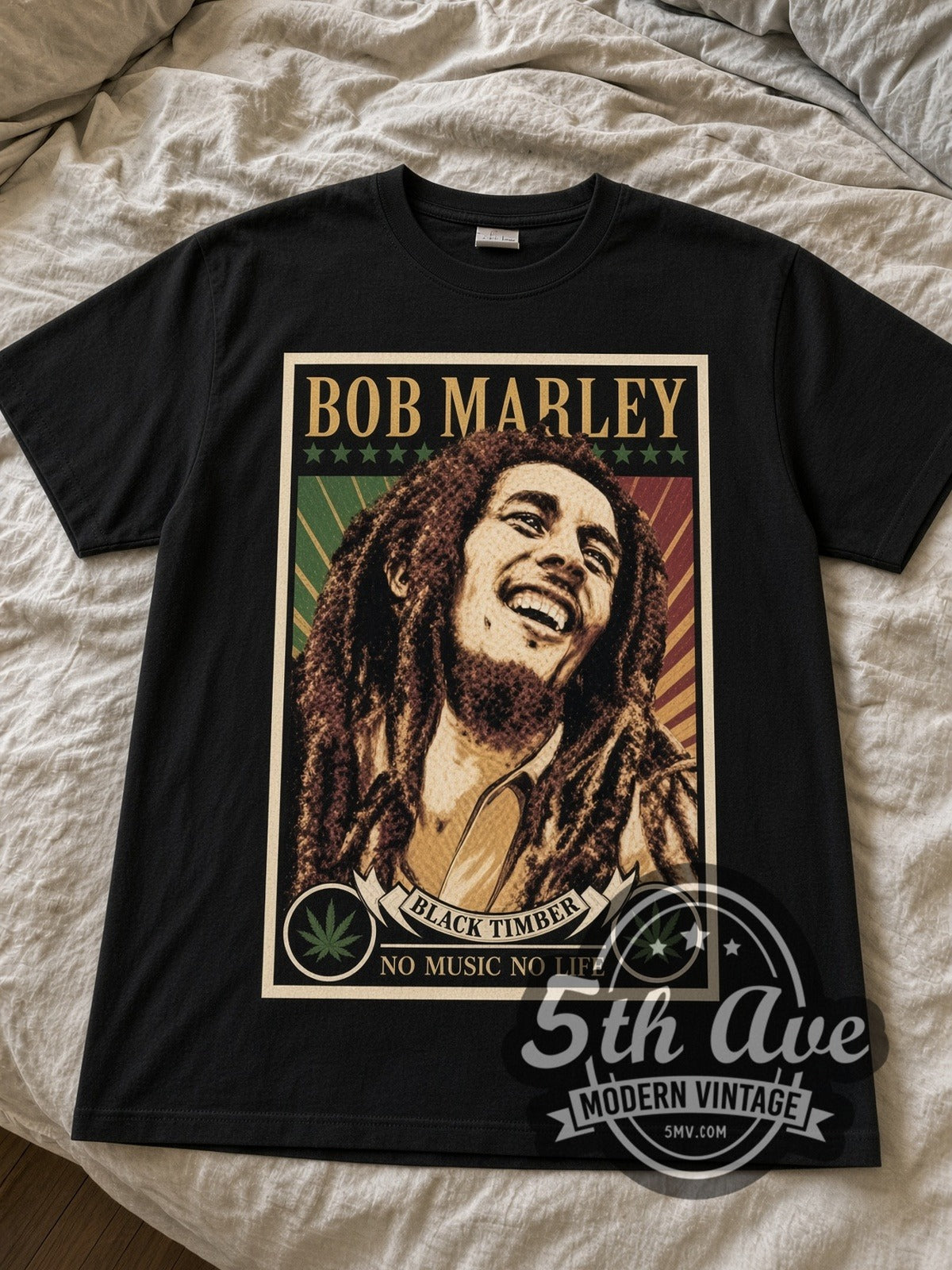 Bob Marley No Music No Life Portrait black graphic tee laid flat on linen bed