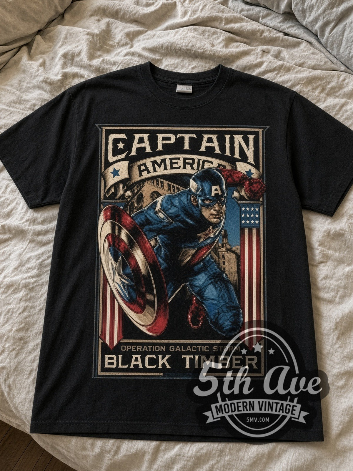 Captain America Operation Galactic Storm Frame black graphic tee laid flat on linen bed